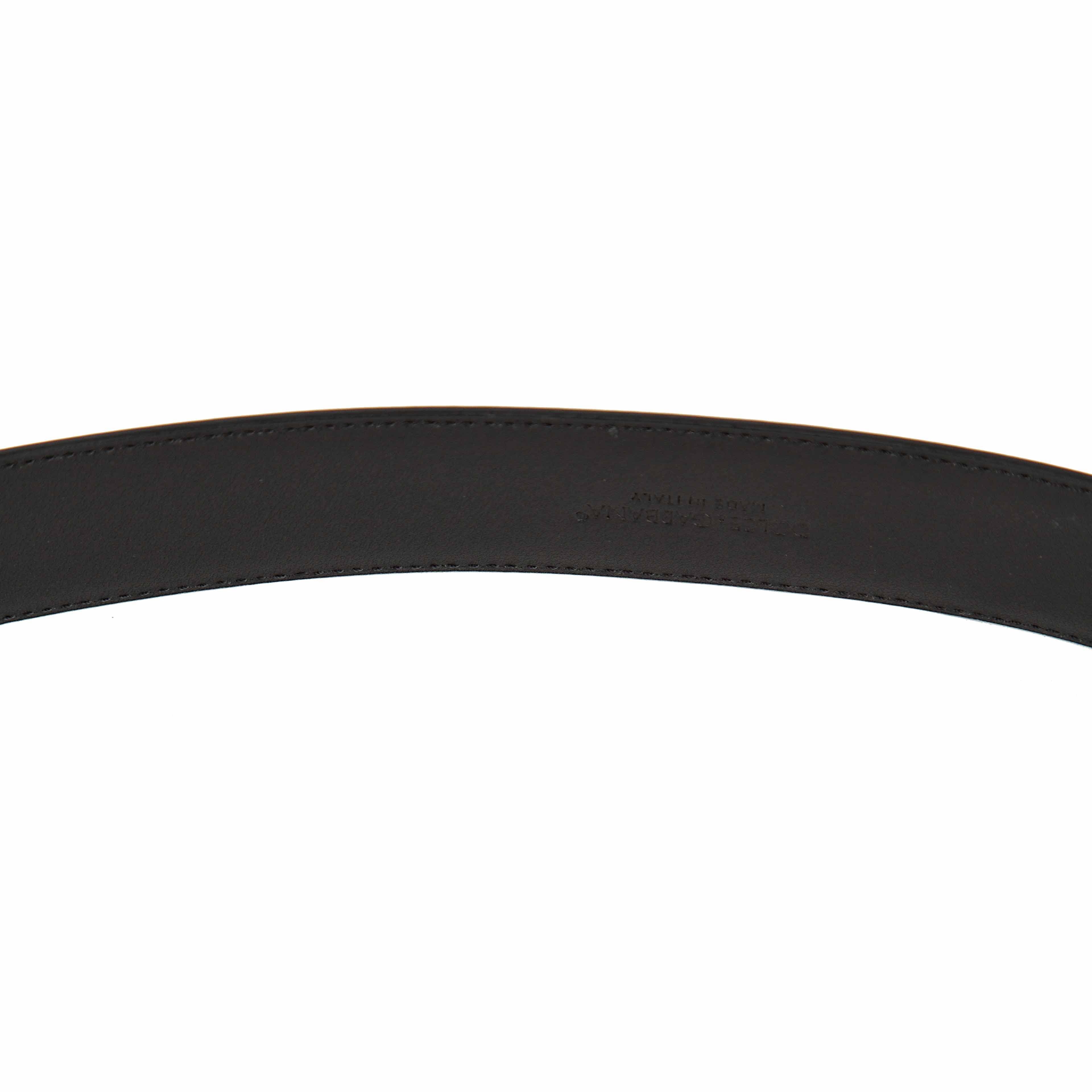 The centerpiece is the iconic interlocking "DG" logo buckle, rendered in a sophisticated matte black finish.