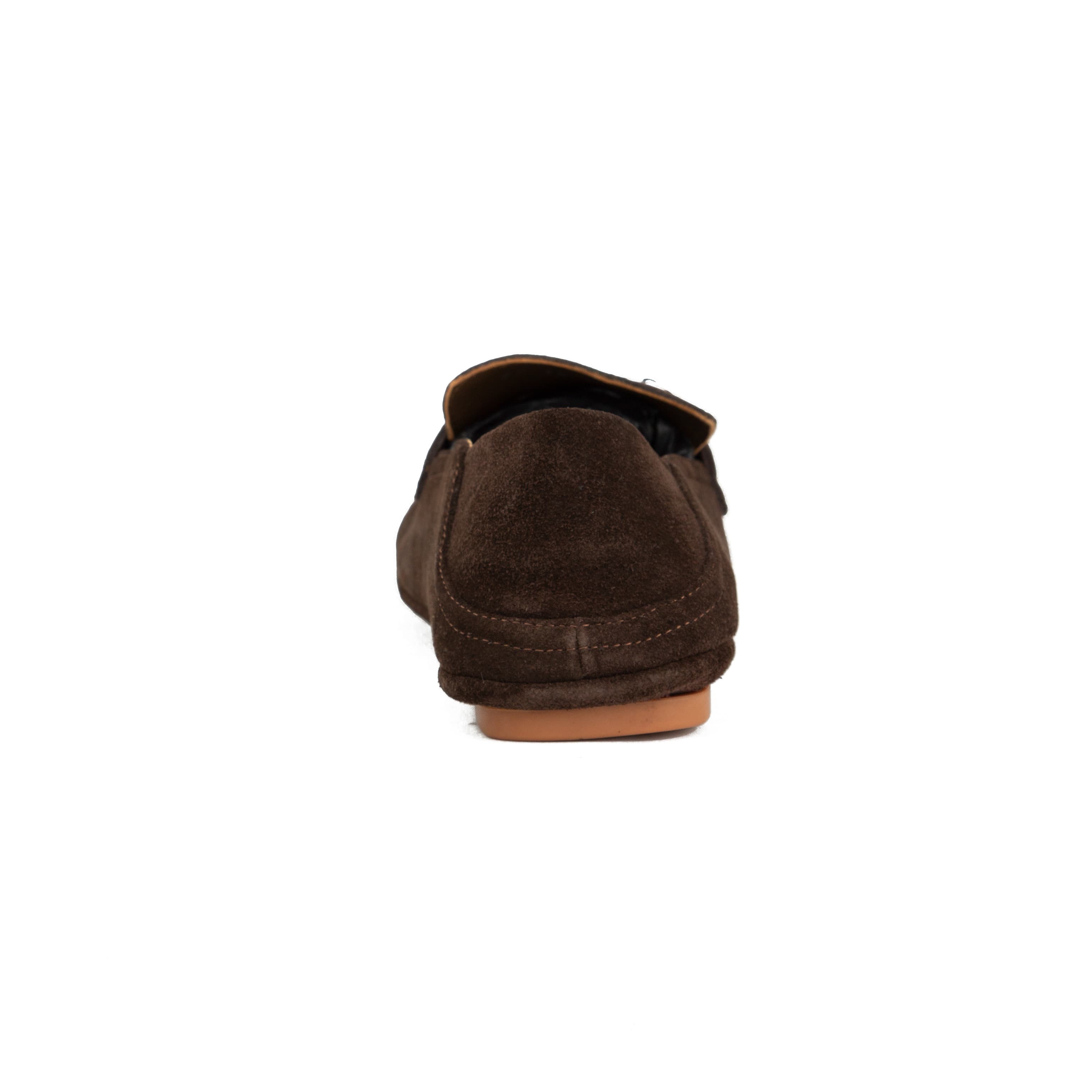 Chocolate brown suede Ferragamo Gancini loafers with collapsible heel and gum sole on white background.
