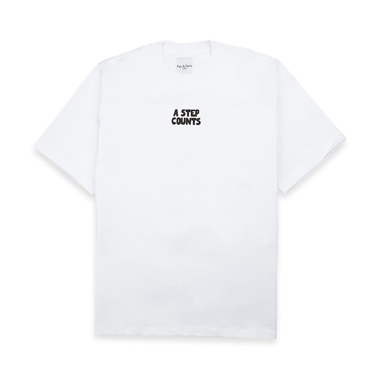 White t-shirt with green footprint graphic and "A Step Counts" text. Unique graphic tee.