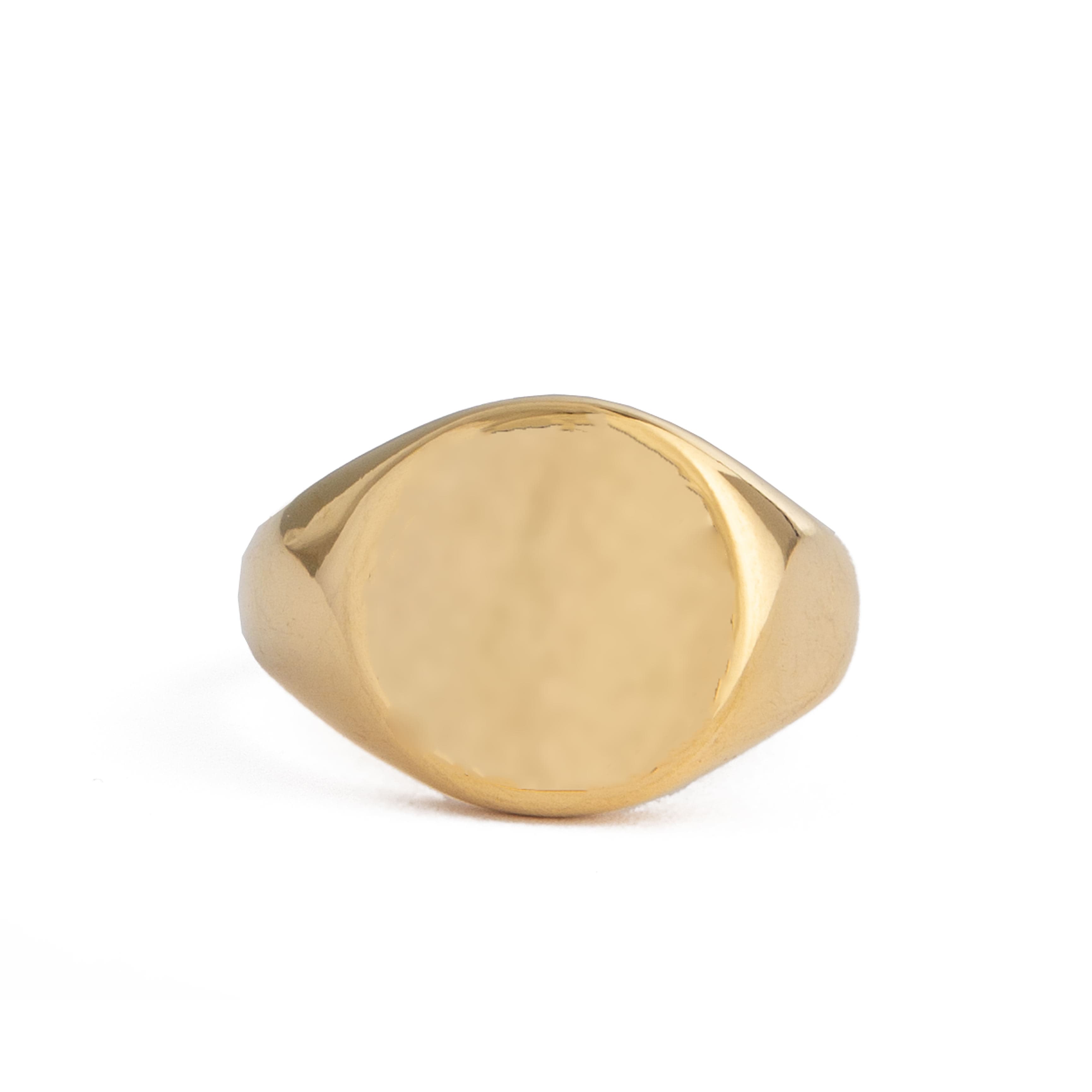 Classic unisex gold signet ring with a smooth round face