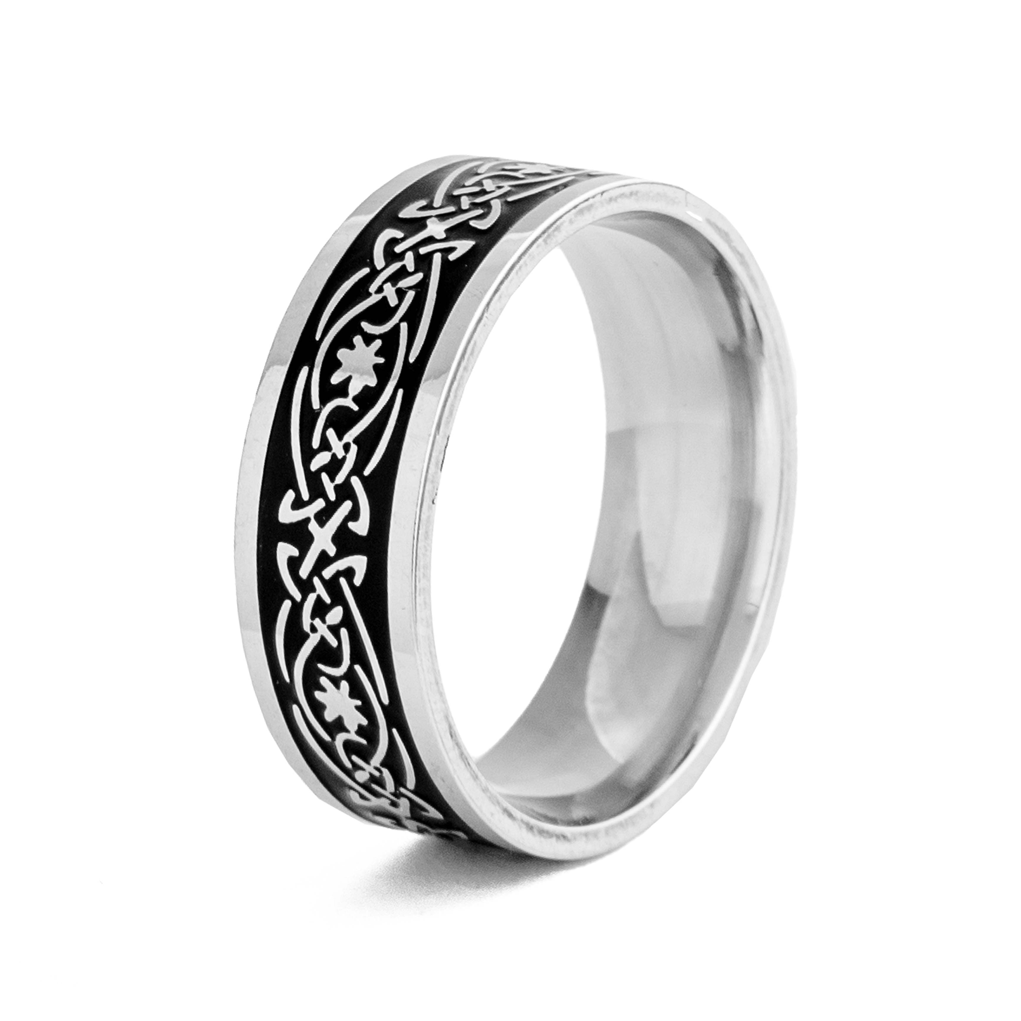 Close-up of a Celtic Knot Tungsten Carbide Ring, showcasing its intricate silver and black design.
