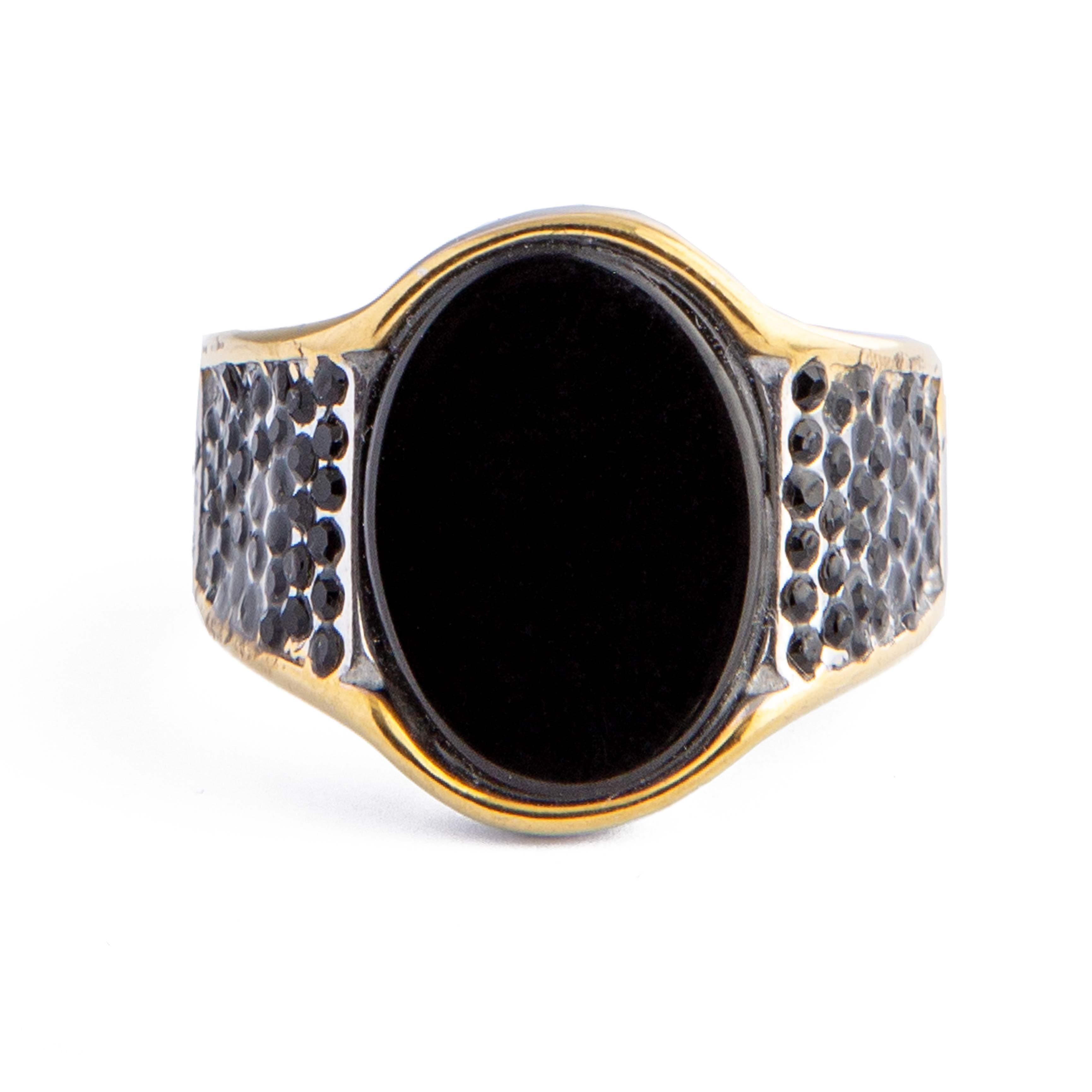 Men's black onyx ring with textured band and gold accents