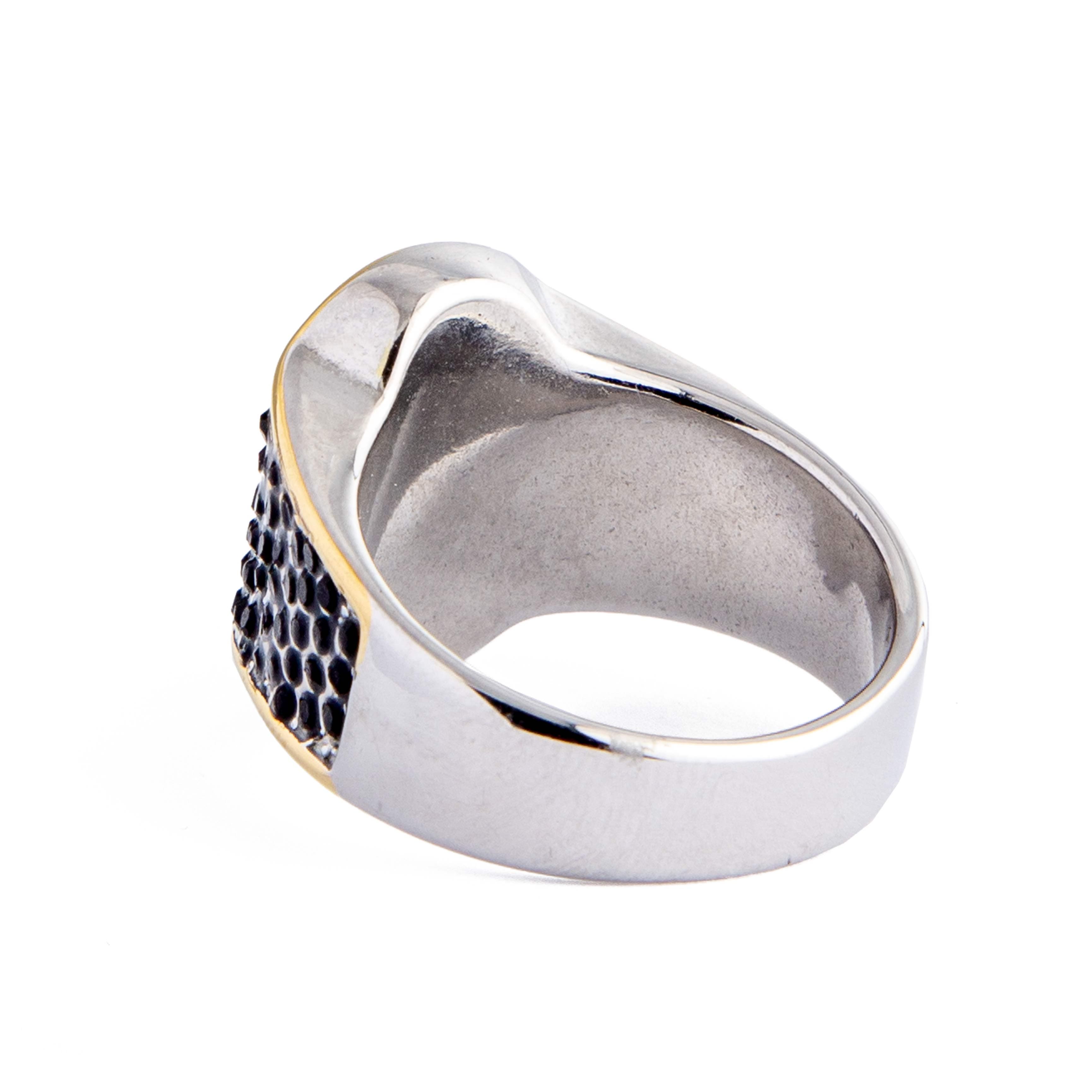 Men's black onyx ring with textured band and gold accents