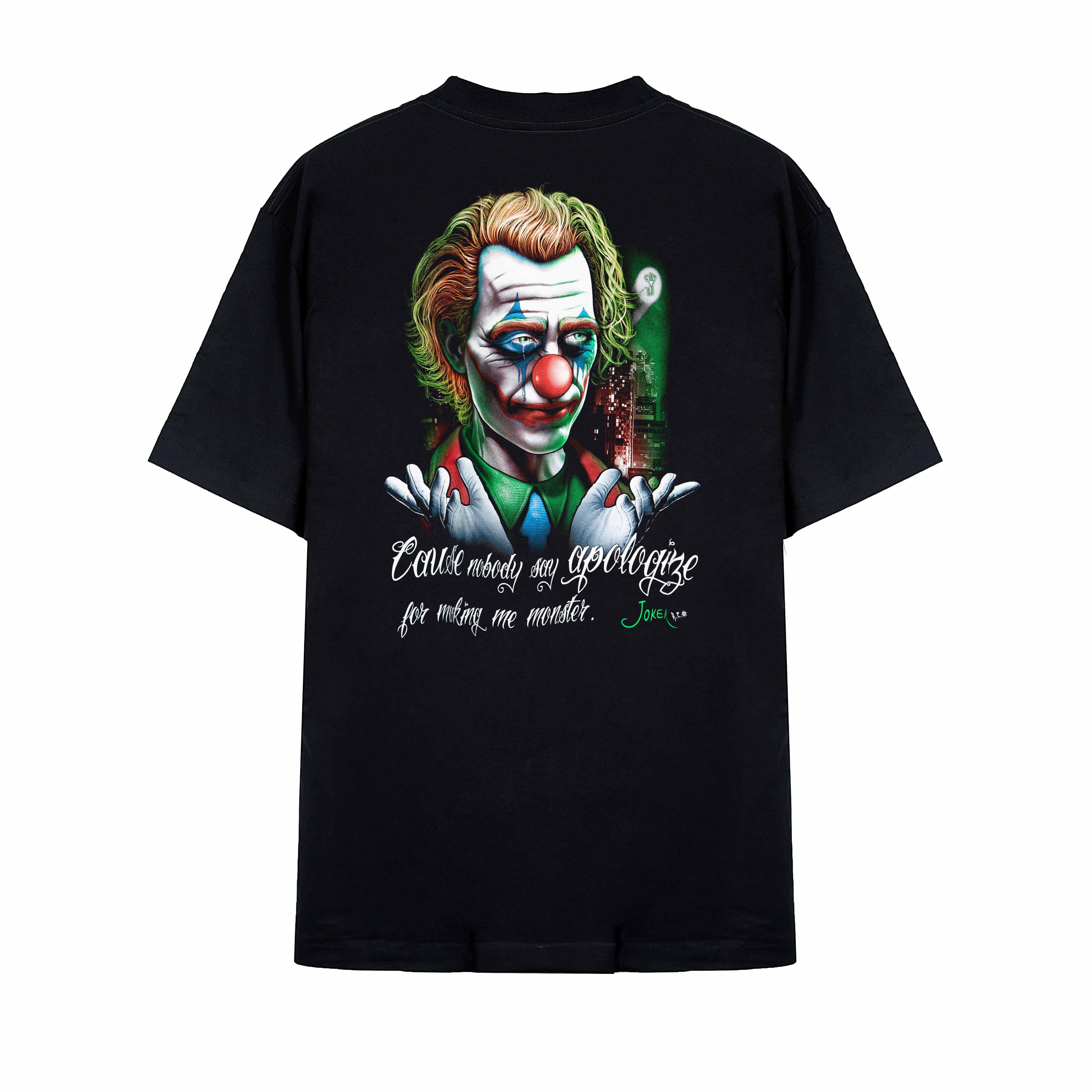 Rock Eagle black t-shirt with a detailed, colorful graphic of the Joker's face, clown makeup, and the quote "Why should I say sorry for my monster?" in red script.