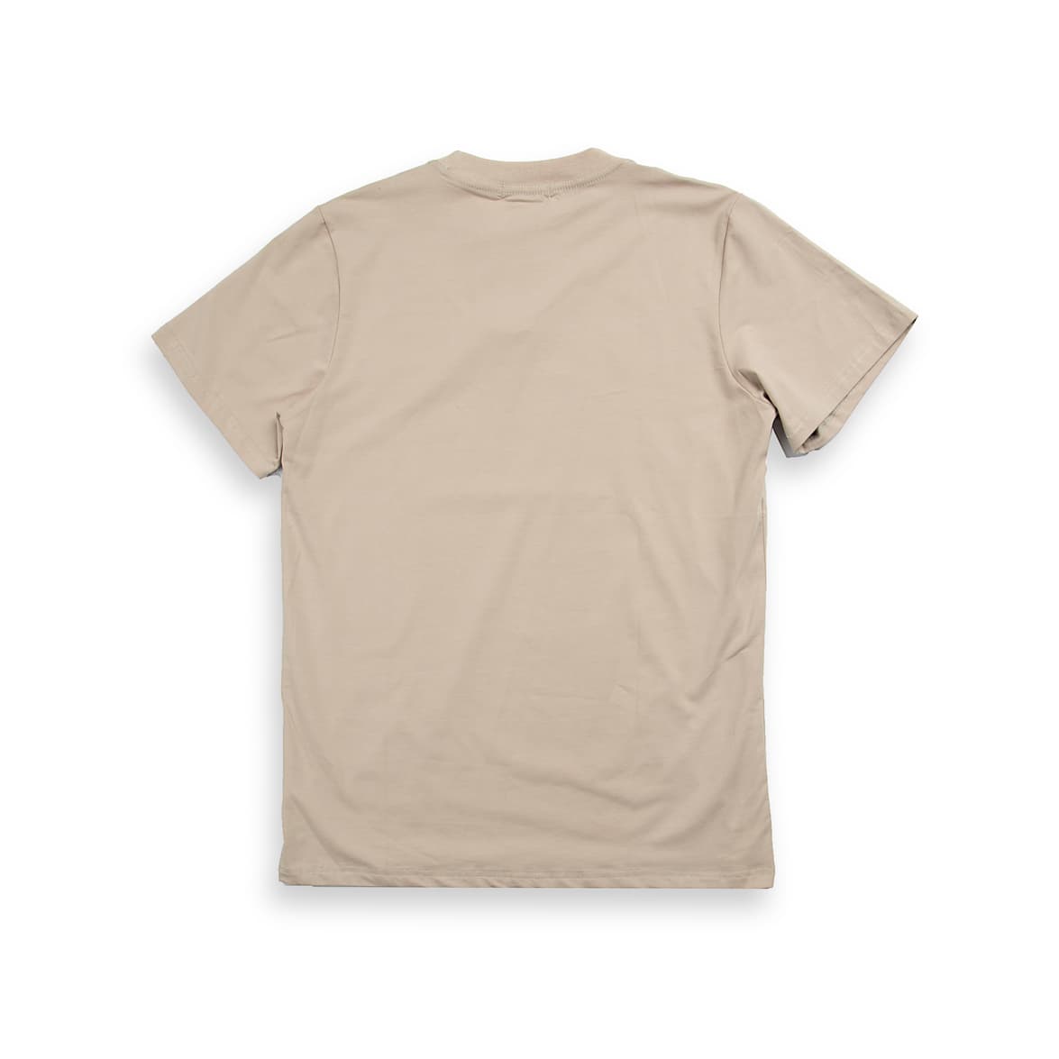 A light, neutral beige (or taupe/tan), short-sleeved, crew-neck t-shirt. It features a small, colorful, embroidered or printed graphic patch on the left chest.