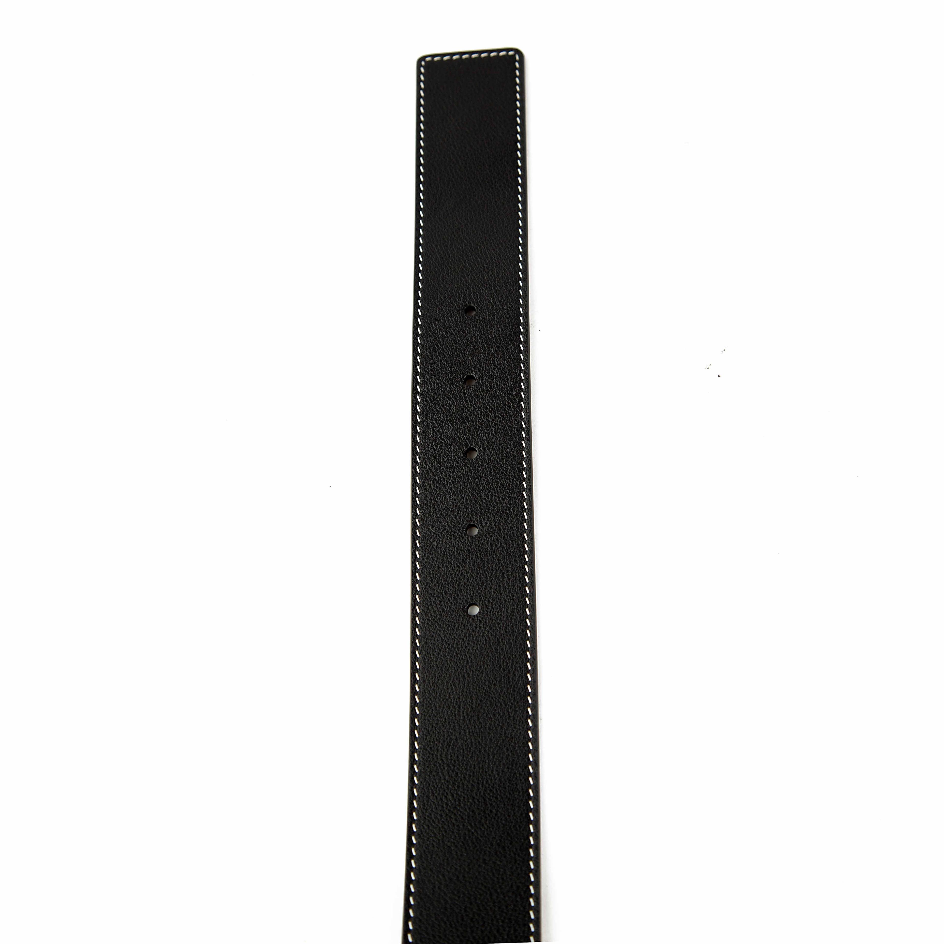 Designed with a reversible contrast lining, the belt offers two distinct looks: a textured brown for a relaxed yet polished feel, and a smooth black for formal occasions.