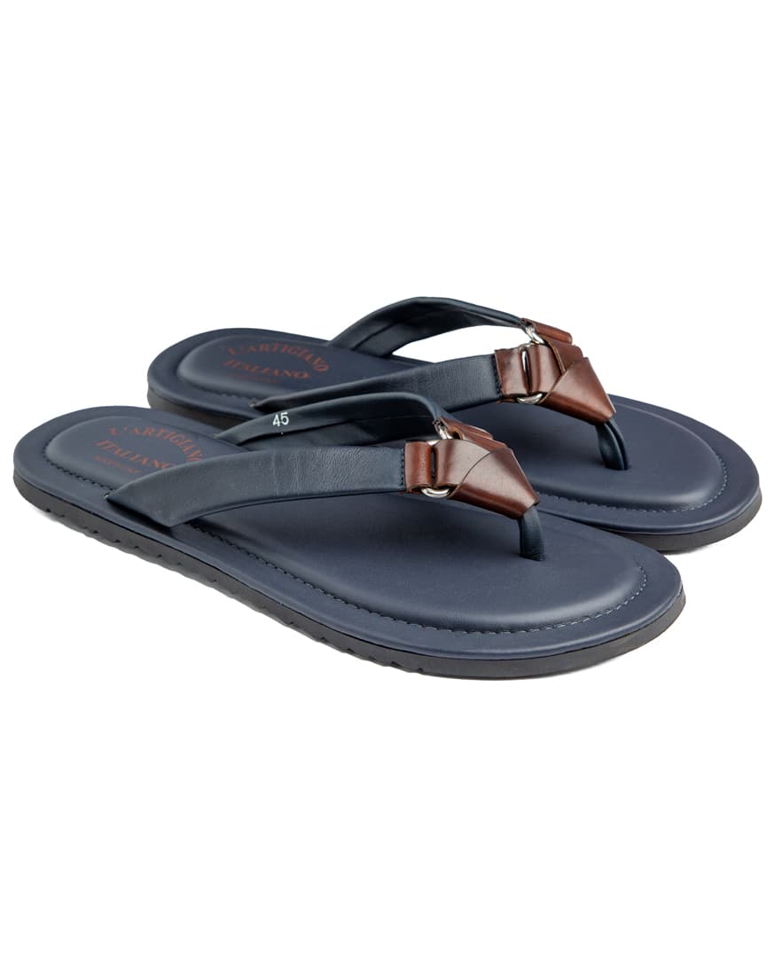 Men's navy blue thong sandals with brown contrast detail.