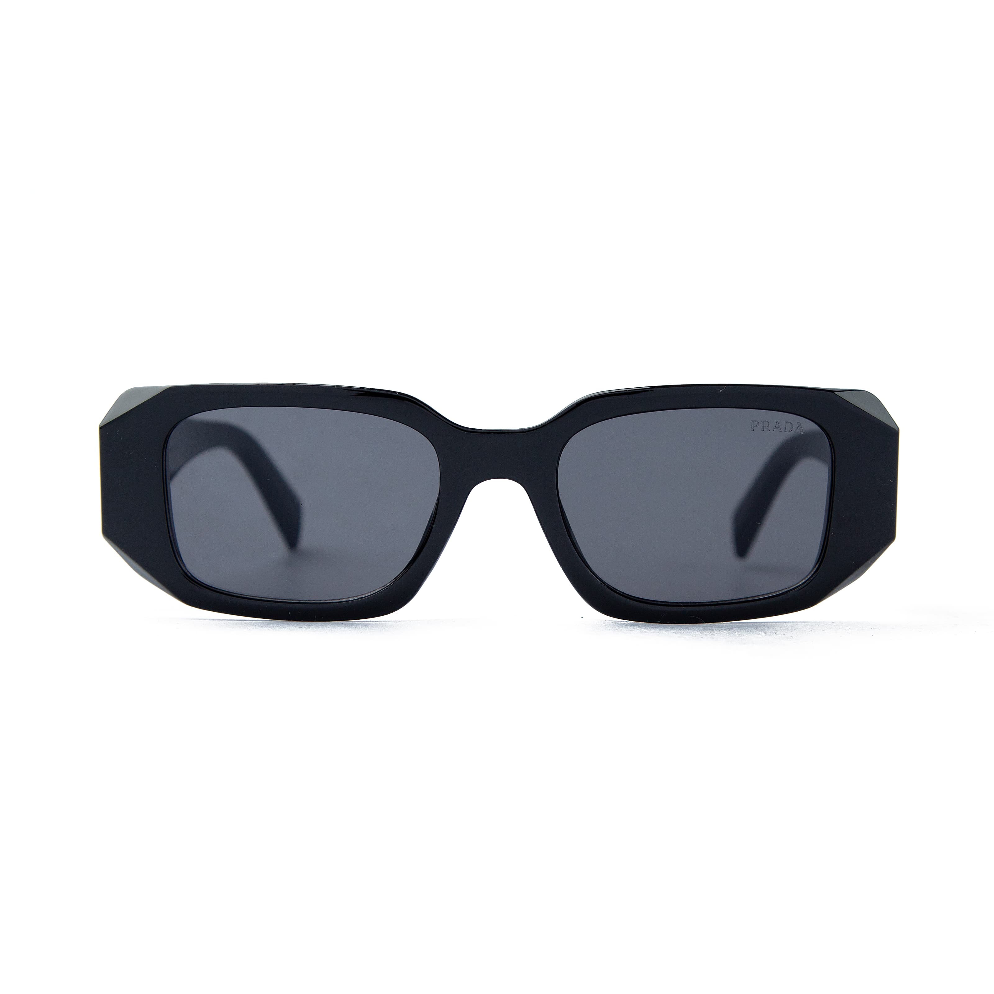 Prada rectangular black sunglasses with dark tinted lenses and Prada Milano logo detailing, offering bold unisex style and UV protection for fashion enthusiasts.