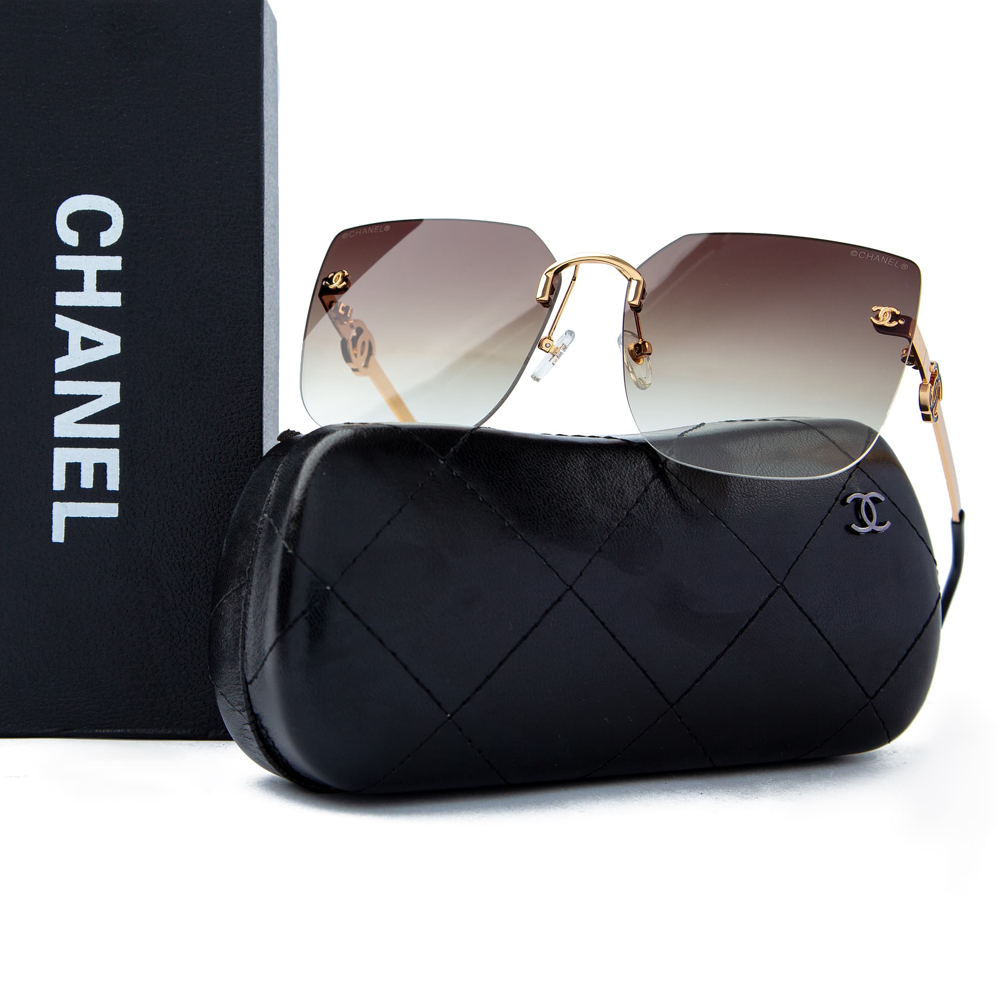 Chanel gradient rimless sunglasses with gold detailing, featuring luxury women's eyewear design and UV protection for a sophisticated look