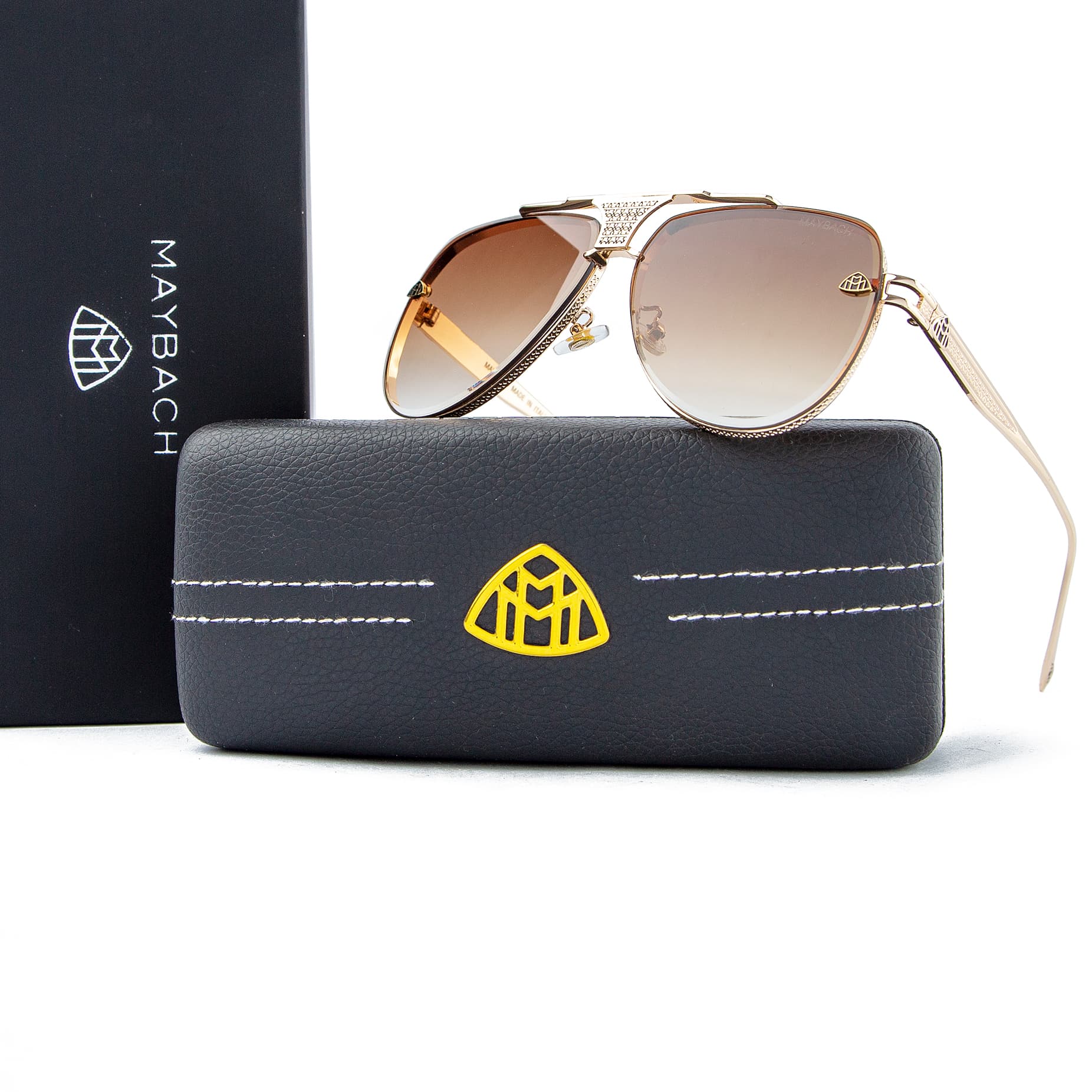 Maybach aviator sunglasses with gold metal frames and gradient brown lenses, unisex design with premium details and iconic Maybach logo