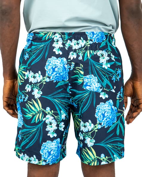 Floral print men's beach short  with blue and green flowers.