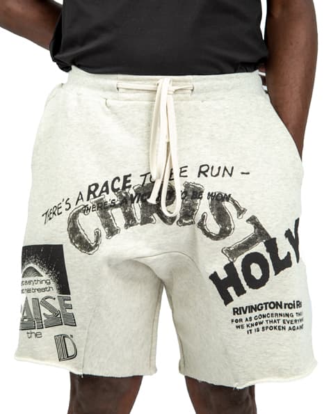 Light grey, graphic print, distressed details, streetwear style.  