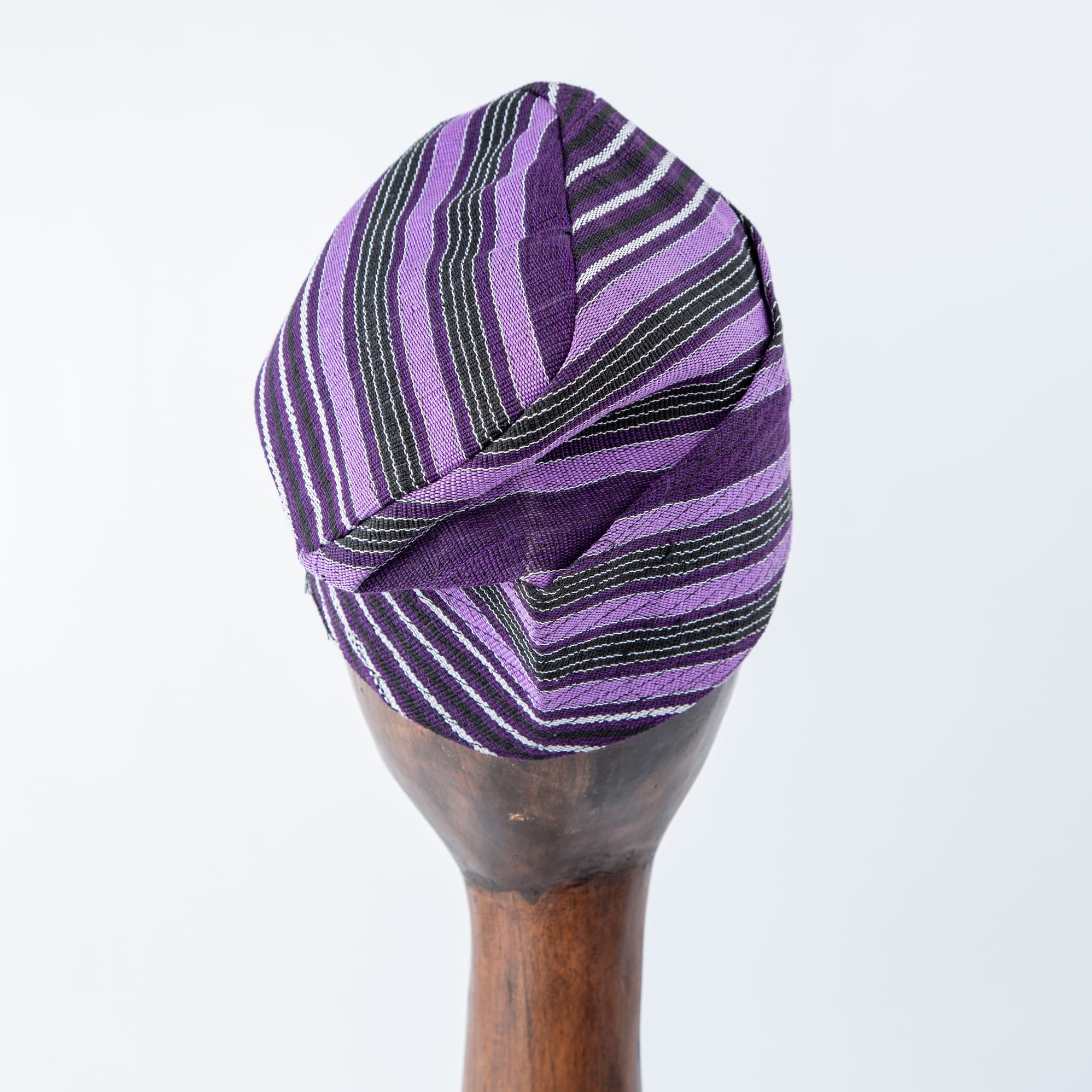 Traditional woven purple cap with black and white stripes – Unisex, perfect for cultural and modern outfits.