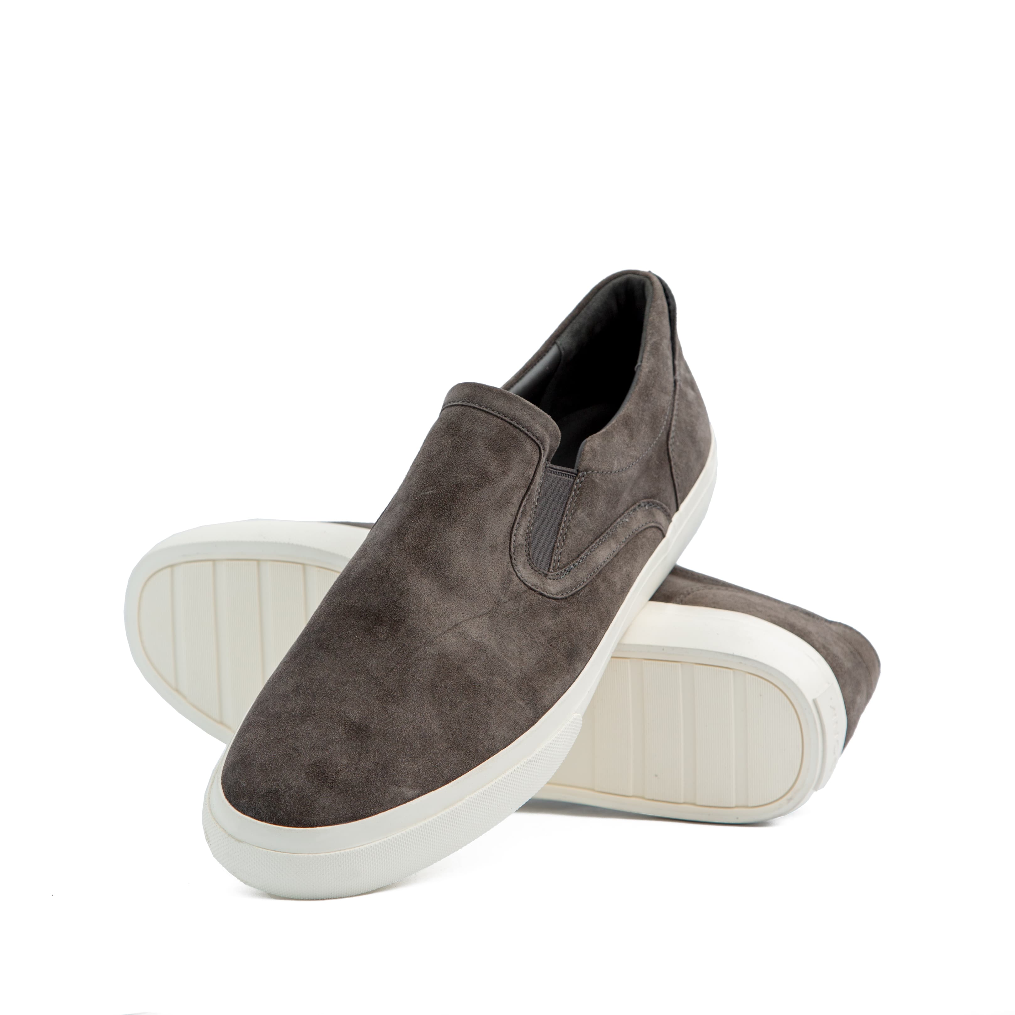 Vince Fairfax slip-on sneakers with white sole for men and women – perfect for casual or smart-casual outfits.