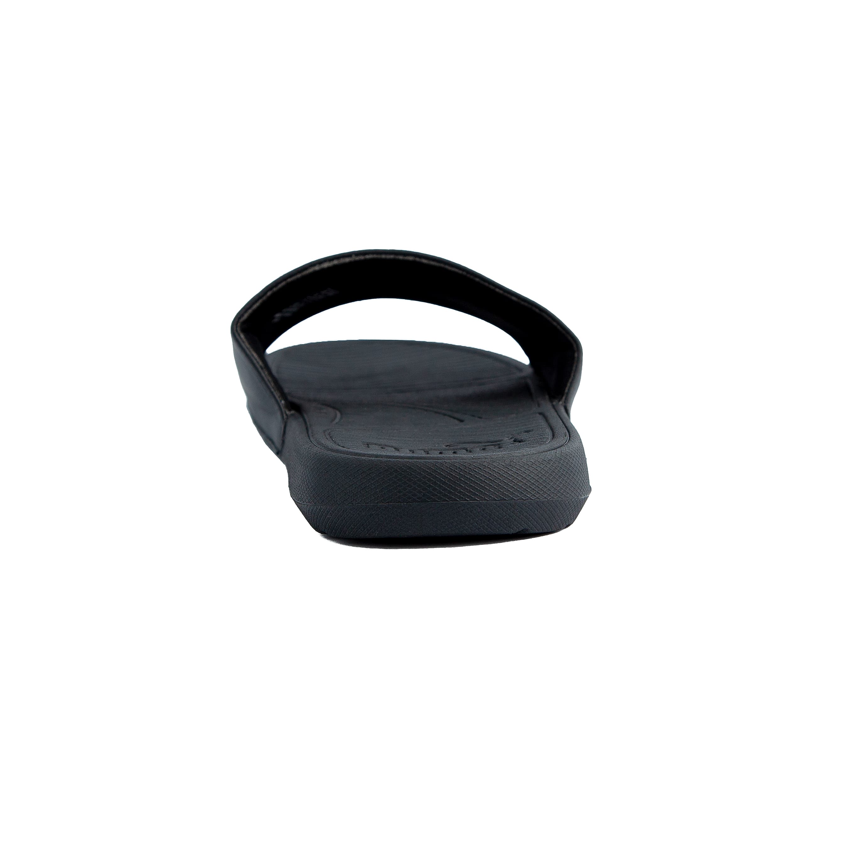 Black Puma slide sandals with white logo, unisex design, durable strap, and comfortable textured footbed for casual wear and relaxation.