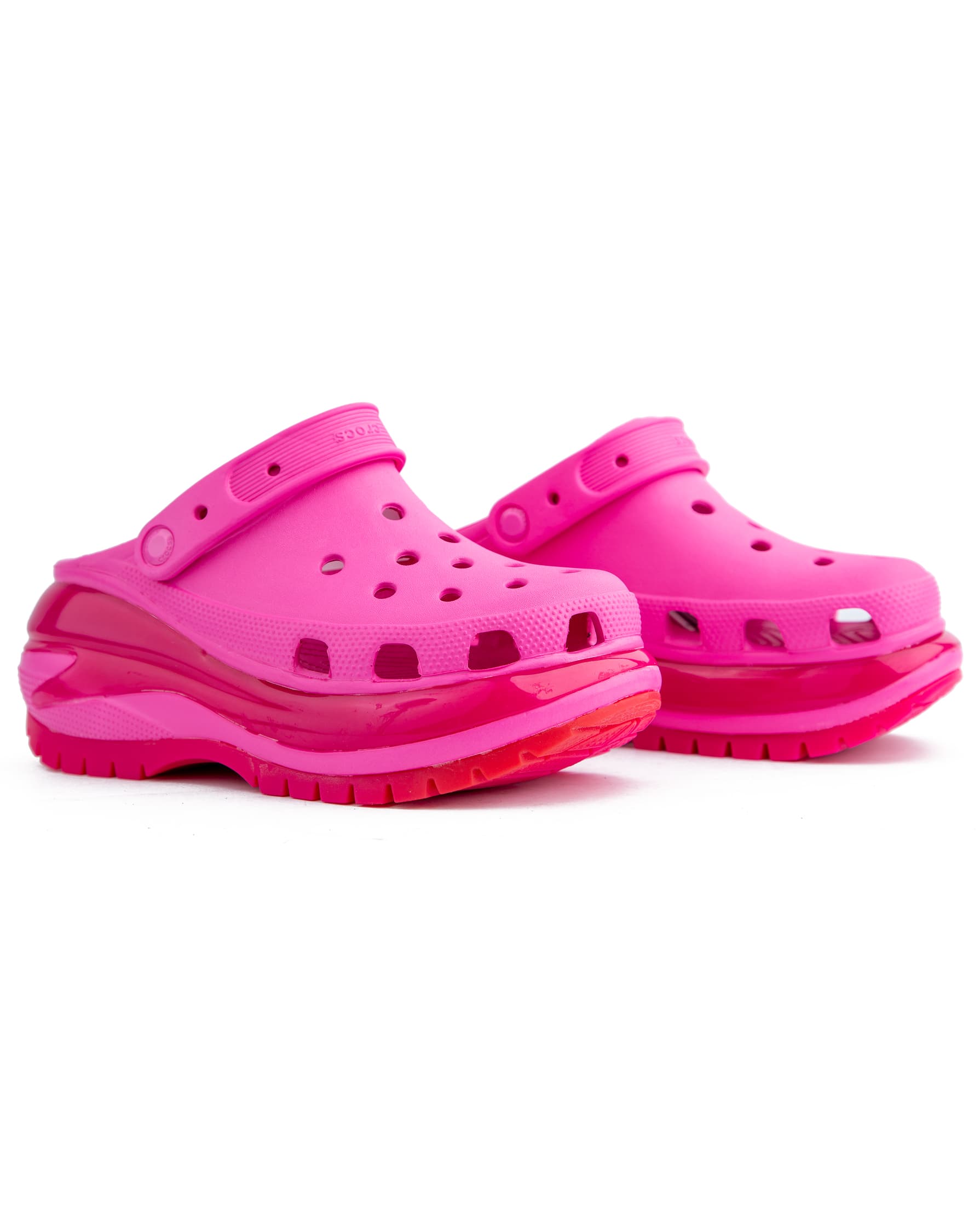 Crocs Mega Crush Clog in bright pink, featuring a platform sole and ventilation ports.