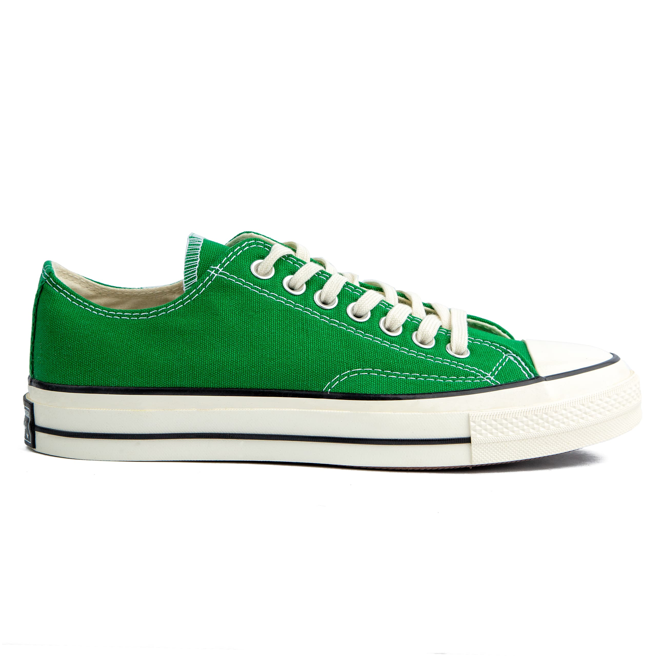 Green Converse Chuck Taylor All Star 70 Low Top Sneakers - Unisex casual footwear with premium canvas material and iconic design.