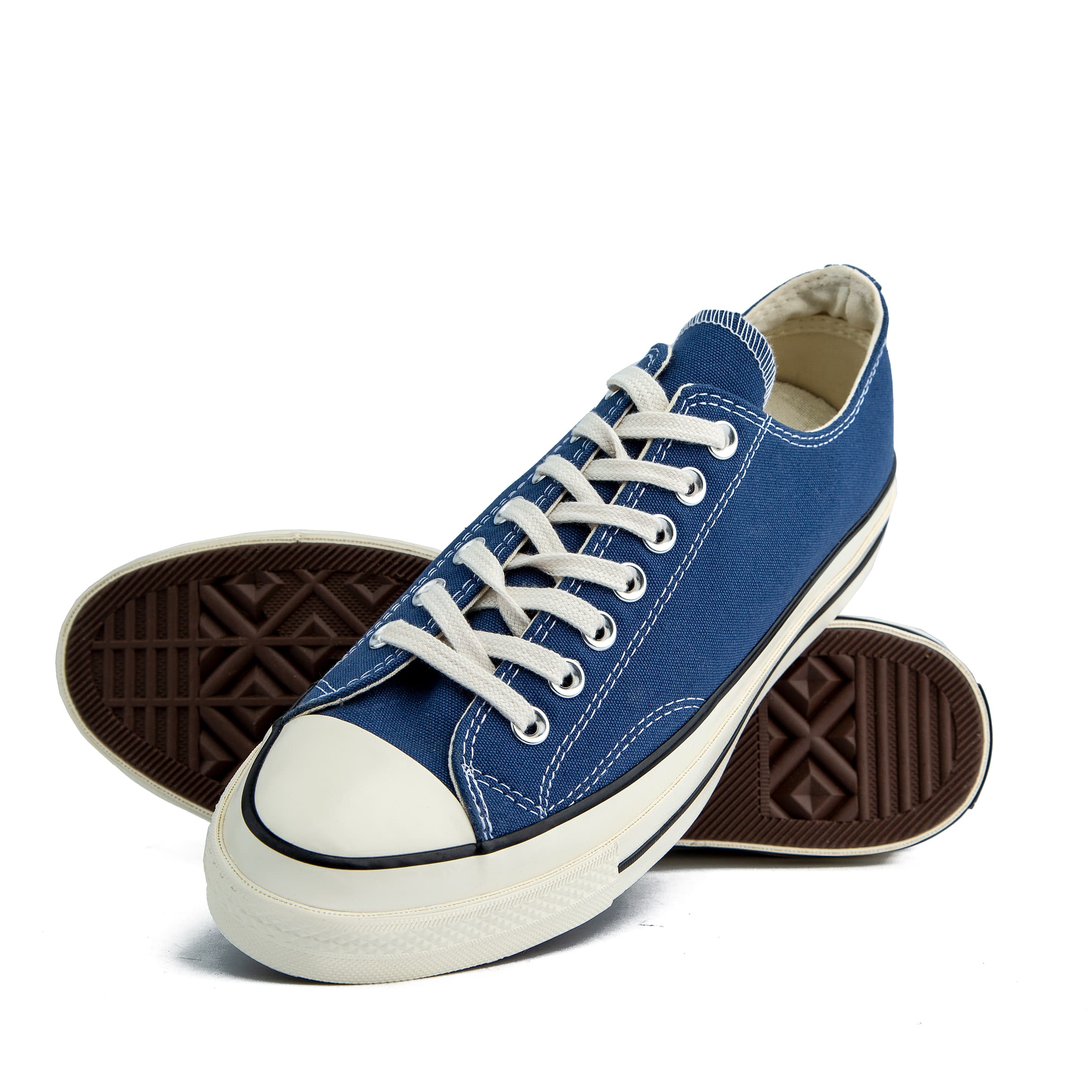 Navy Blue Converse Chuck Taylor All Star 70 Low Top Sneakers - Classic unisex canvas shoes with premium comfort and retro-inspired design.