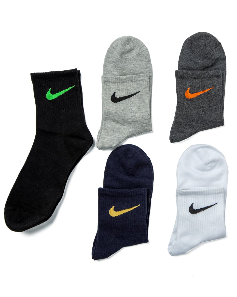 Nike Everyday Plus Crew Socks - Multi-Pack, featuring grey, navy, light grey, black, and white pairs with contrasting Nike logo detailing.