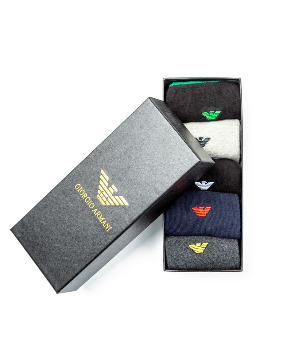 Giorgio Armani Cotton Blend Socks Multi-Pack, featuring black, light grey, navy, and dark grey pairs with ribbed design and signature logo detailing.