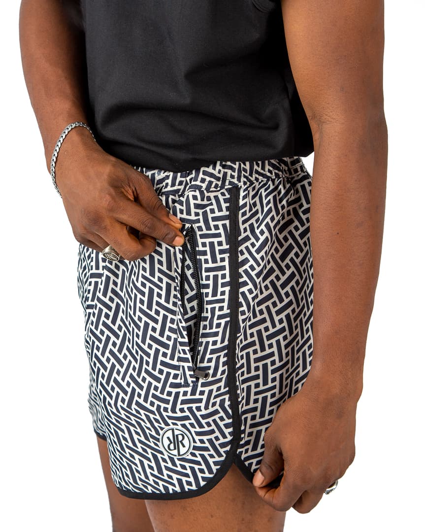 "Black and white geometric men's beach shorts with drawstring waist – stylish, quick-dry, lightweight, and perfect for summer, beach, and poolside wear.