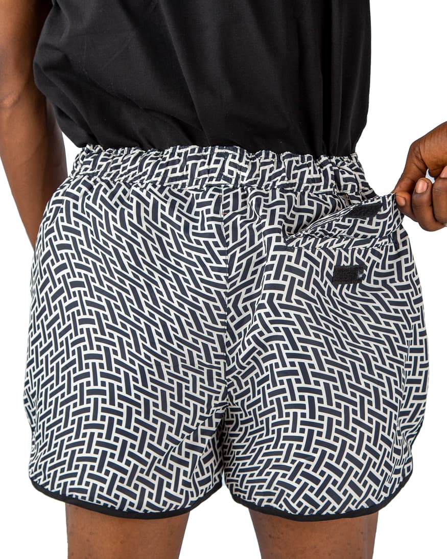 Black and white geometric men's beach shorts with drawstring waist – stylish, quick-dry, lightweight, and perfect for summer, beach, and poolside wear.