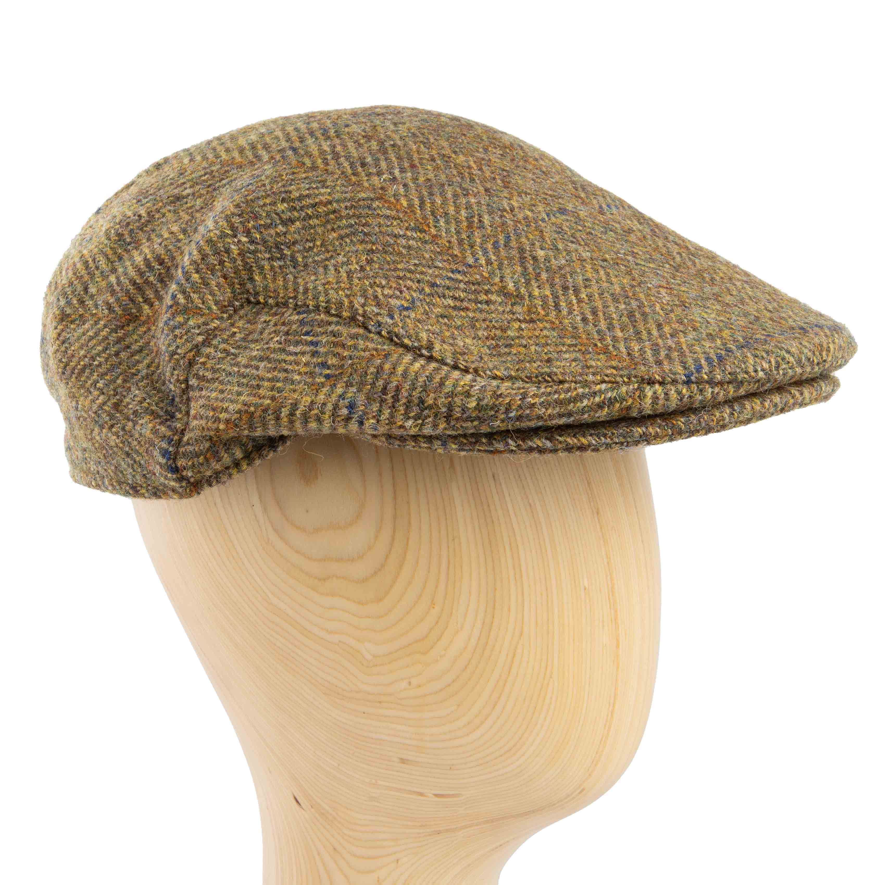 Premium brown herringbone tweed flat cap for men, ideal for traditional or sophisticated casual wear.