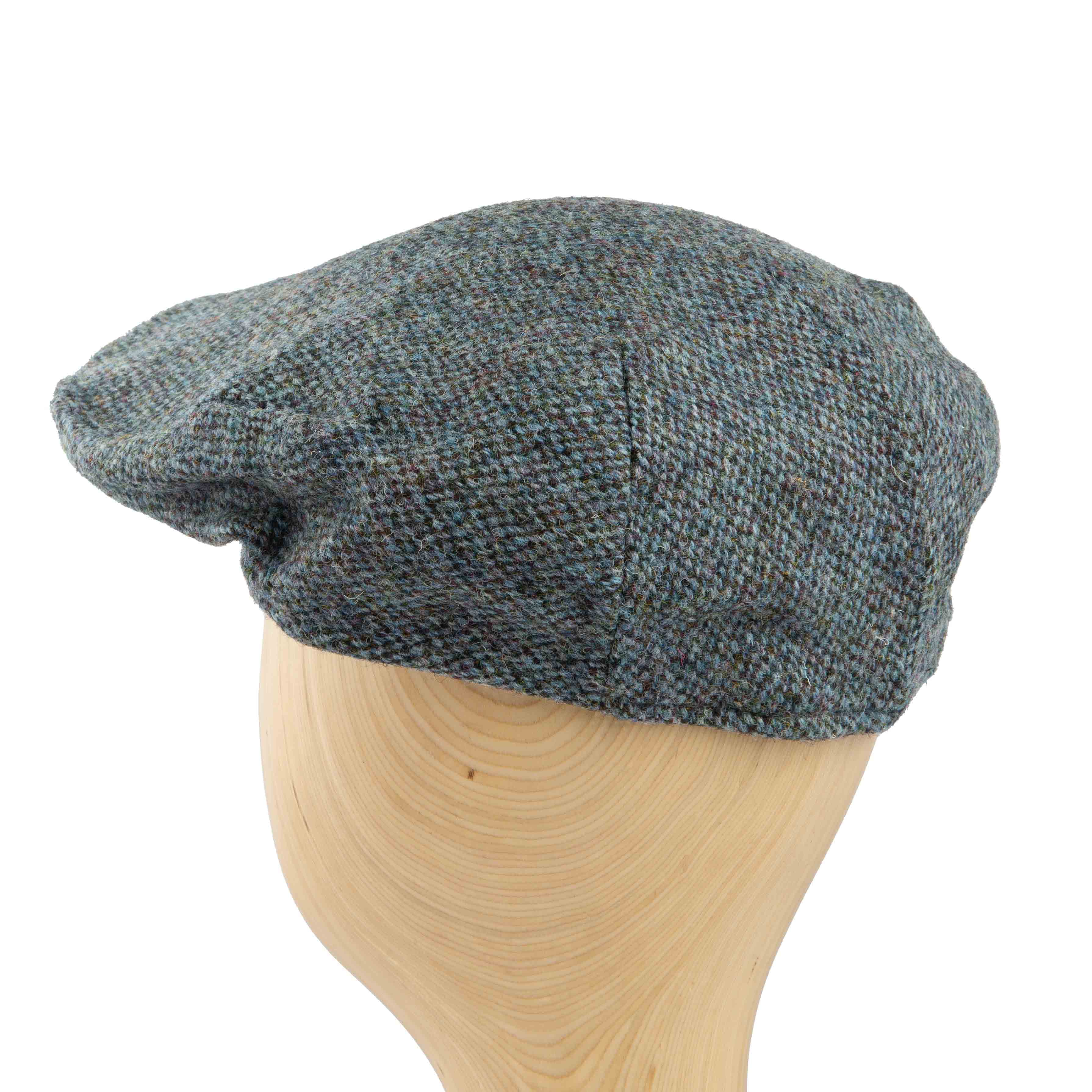 Embrace classic Irish heritage with our men's Donegal tweed flat cap. Featuring rich texture and signature colorful flecks, it's the perfect accessory for a refined, timeless look.