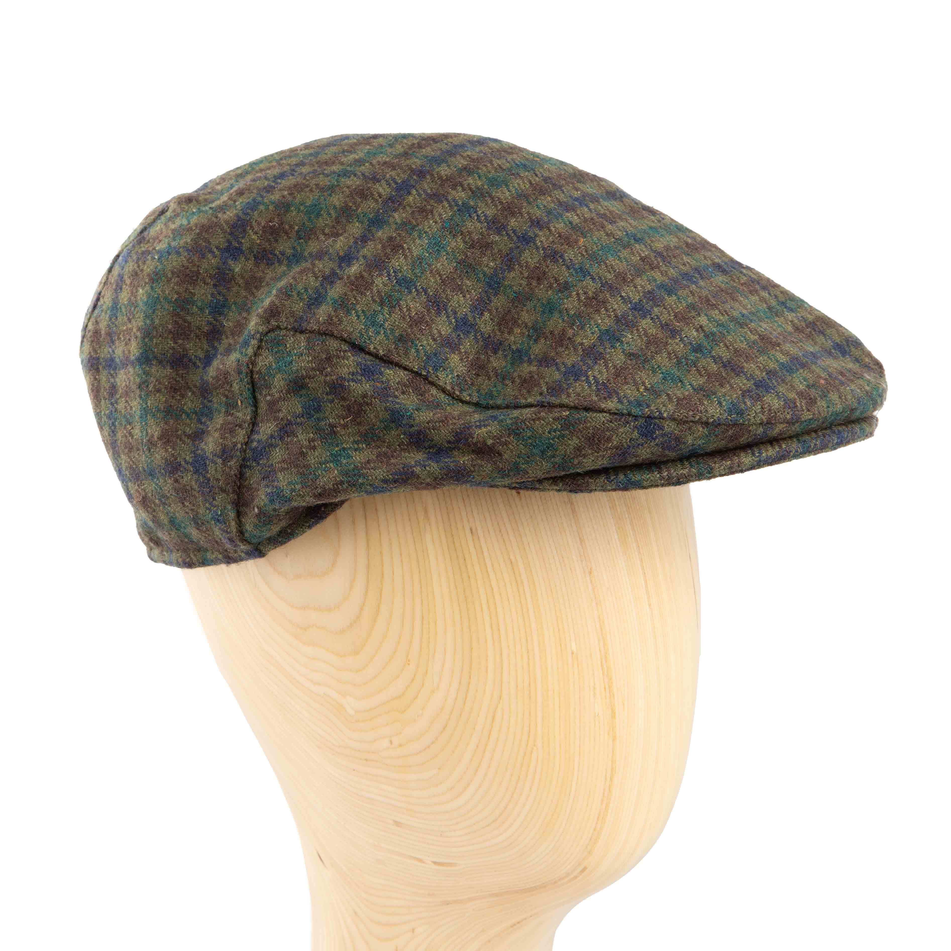 Classic checkered tweed flat cap for men, perfect for traditional or country-inspired wear.