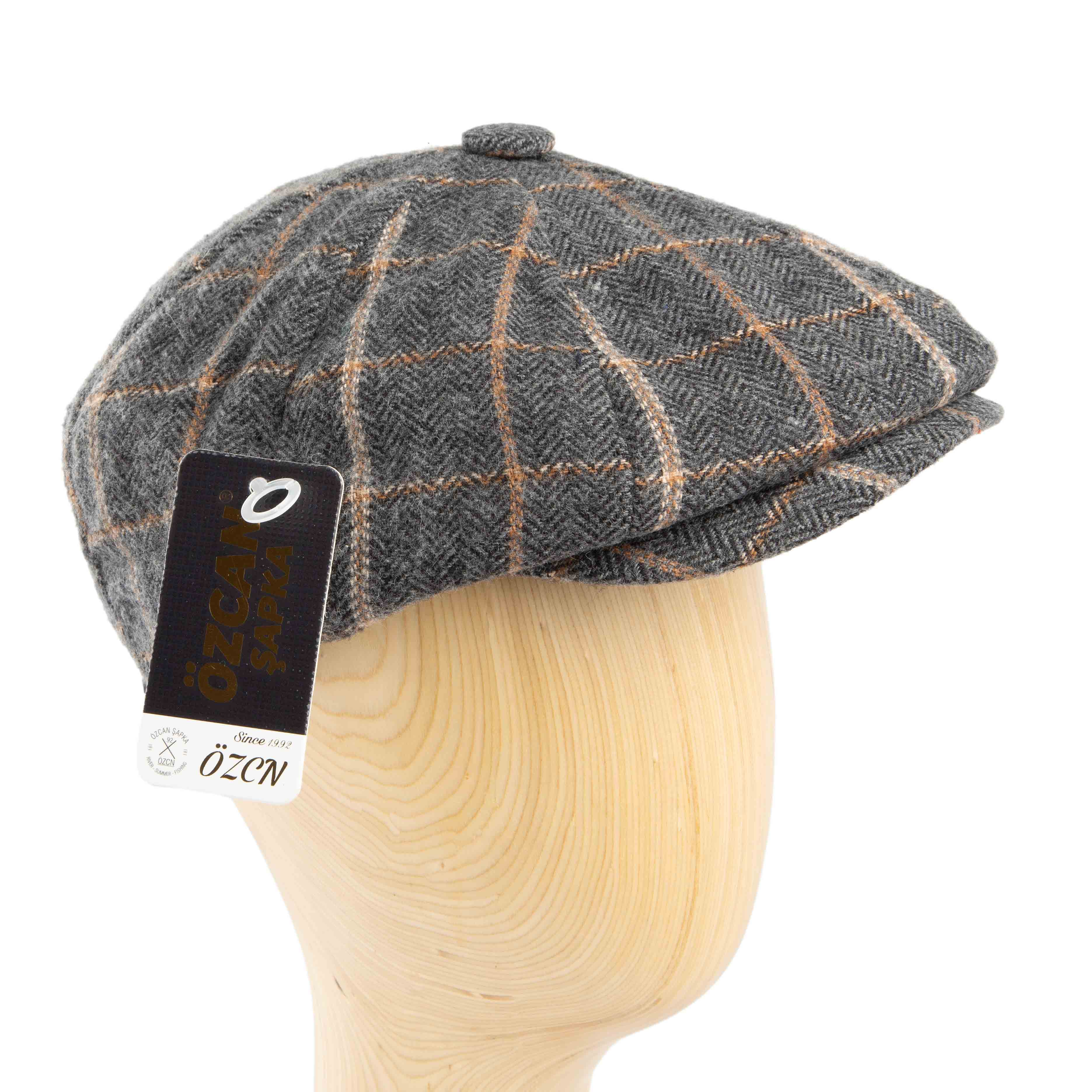 Stylish grey plaid newsboy cap for men, perfect for a vintage or sophisticated casual look.