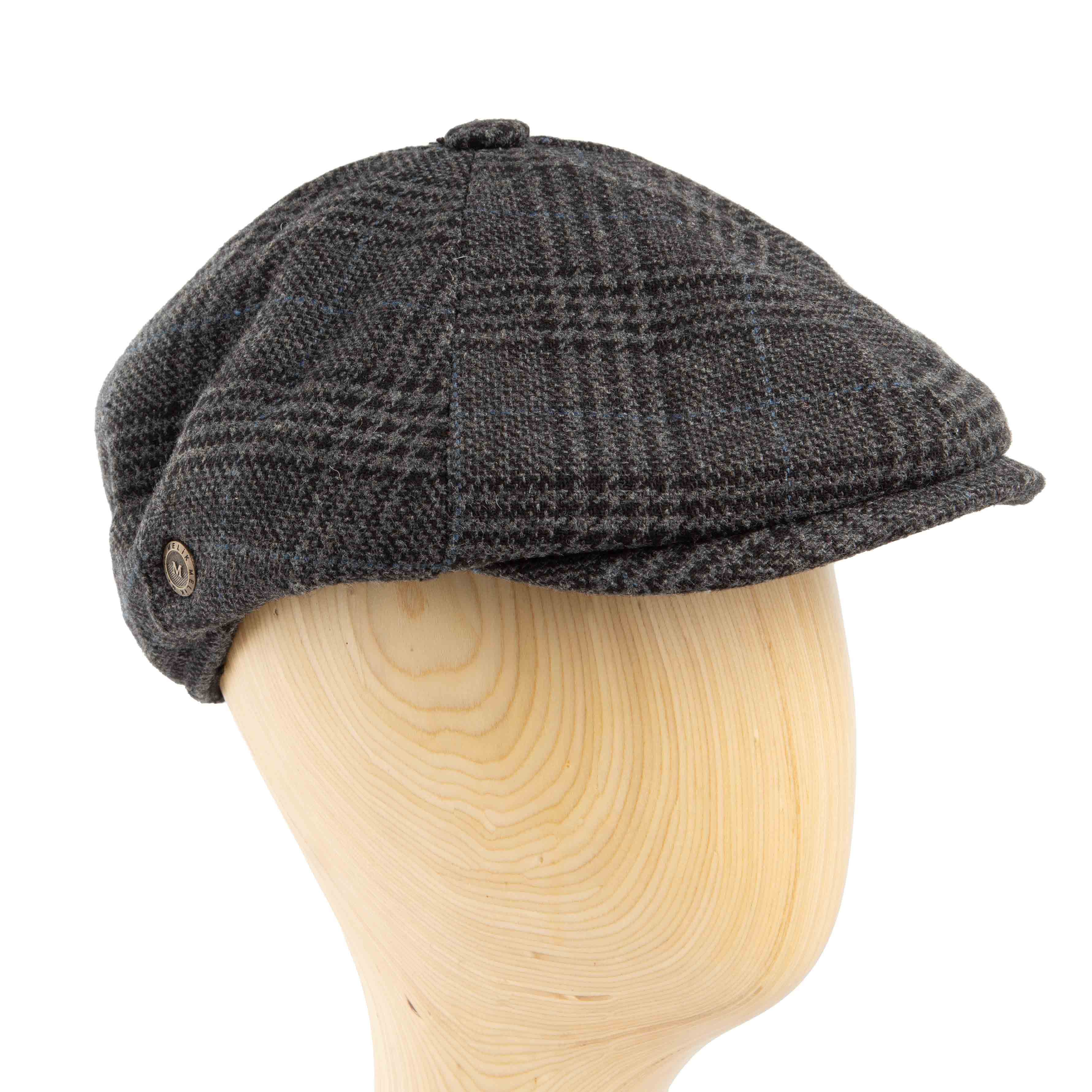 "Dark plaid newsboy cap, classic unisex style, textured wool blend, vintage fashion accessory"