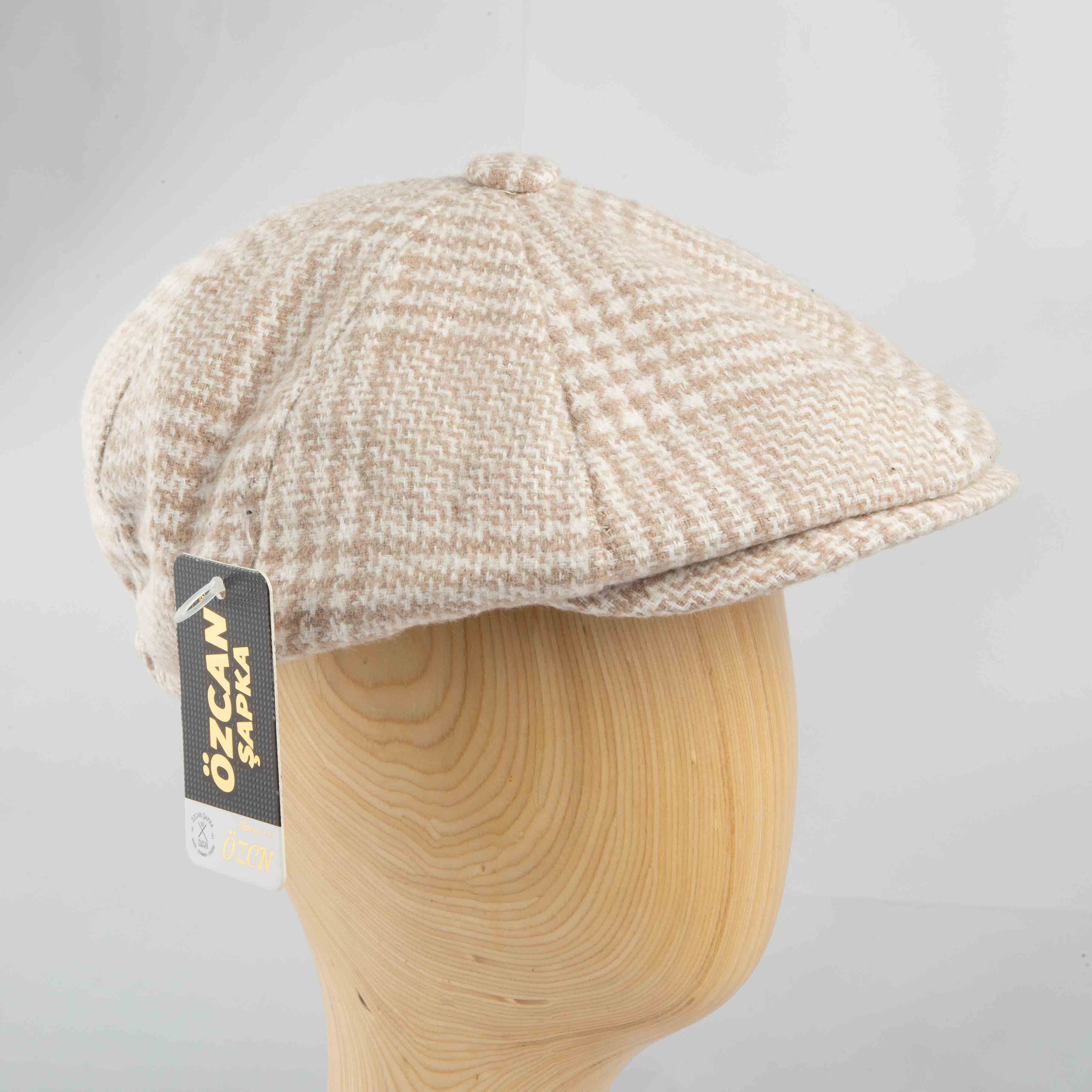 Beige and light brown plaid newsboy cap, classic unisex style, textured fabric, vintage fashion accessory