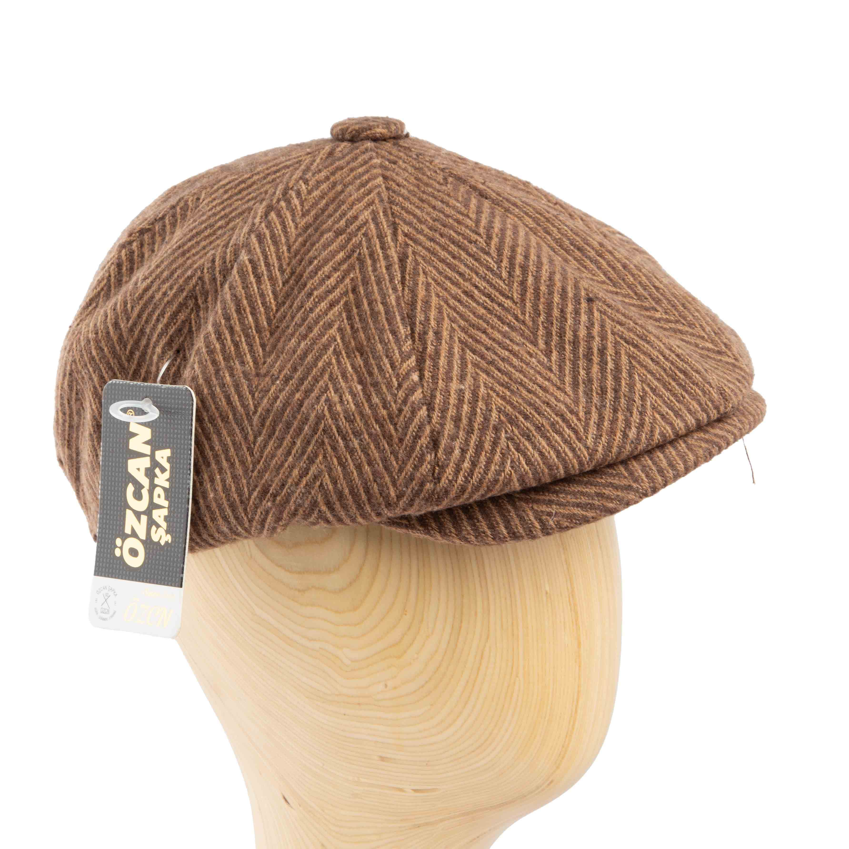 Brown herringbone newsboy cap, classic unisex style, textured fabric, vintage fashion accessory