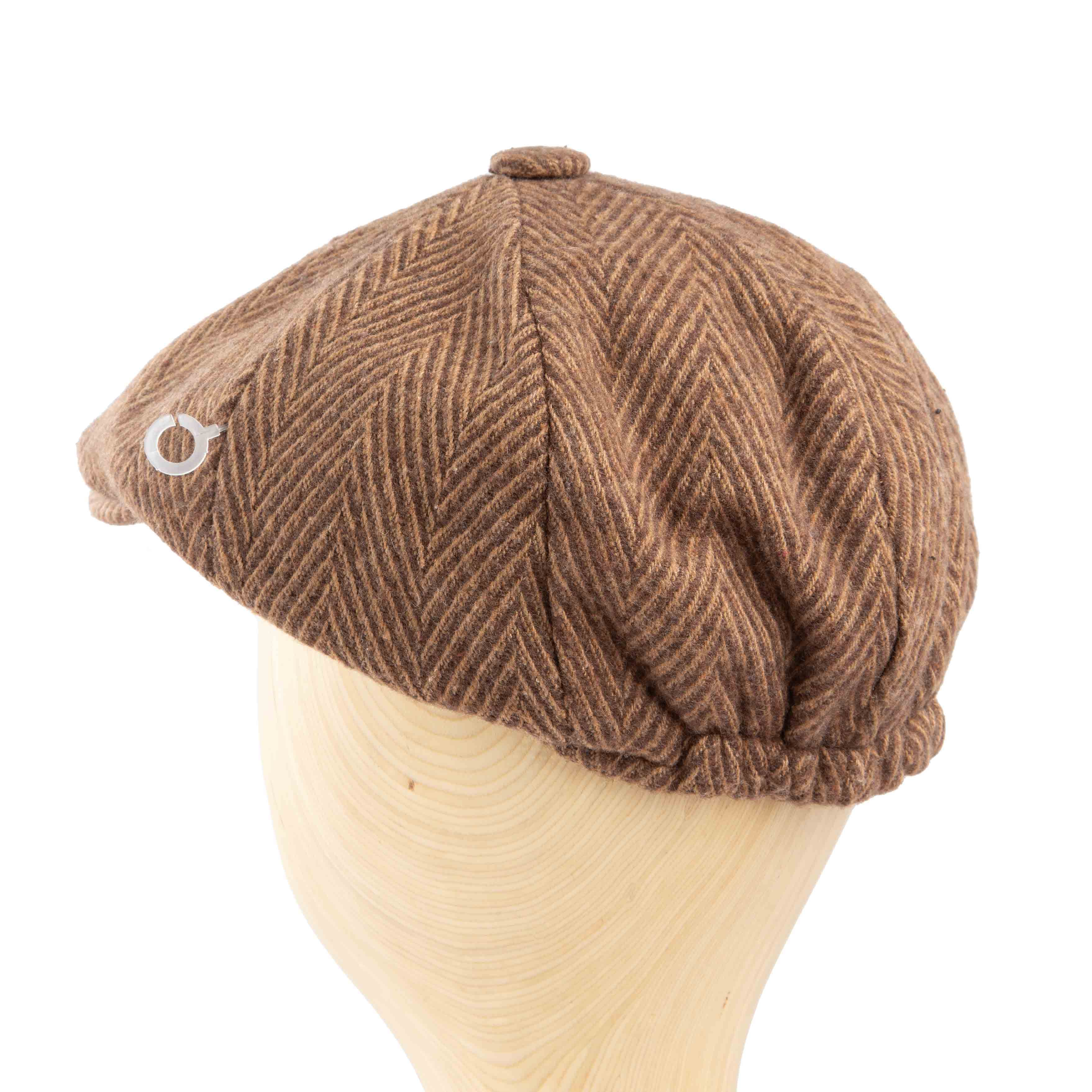 Brown herringbone newsboy cap, classic unisex style, textured fabric, vintage fashion accessory