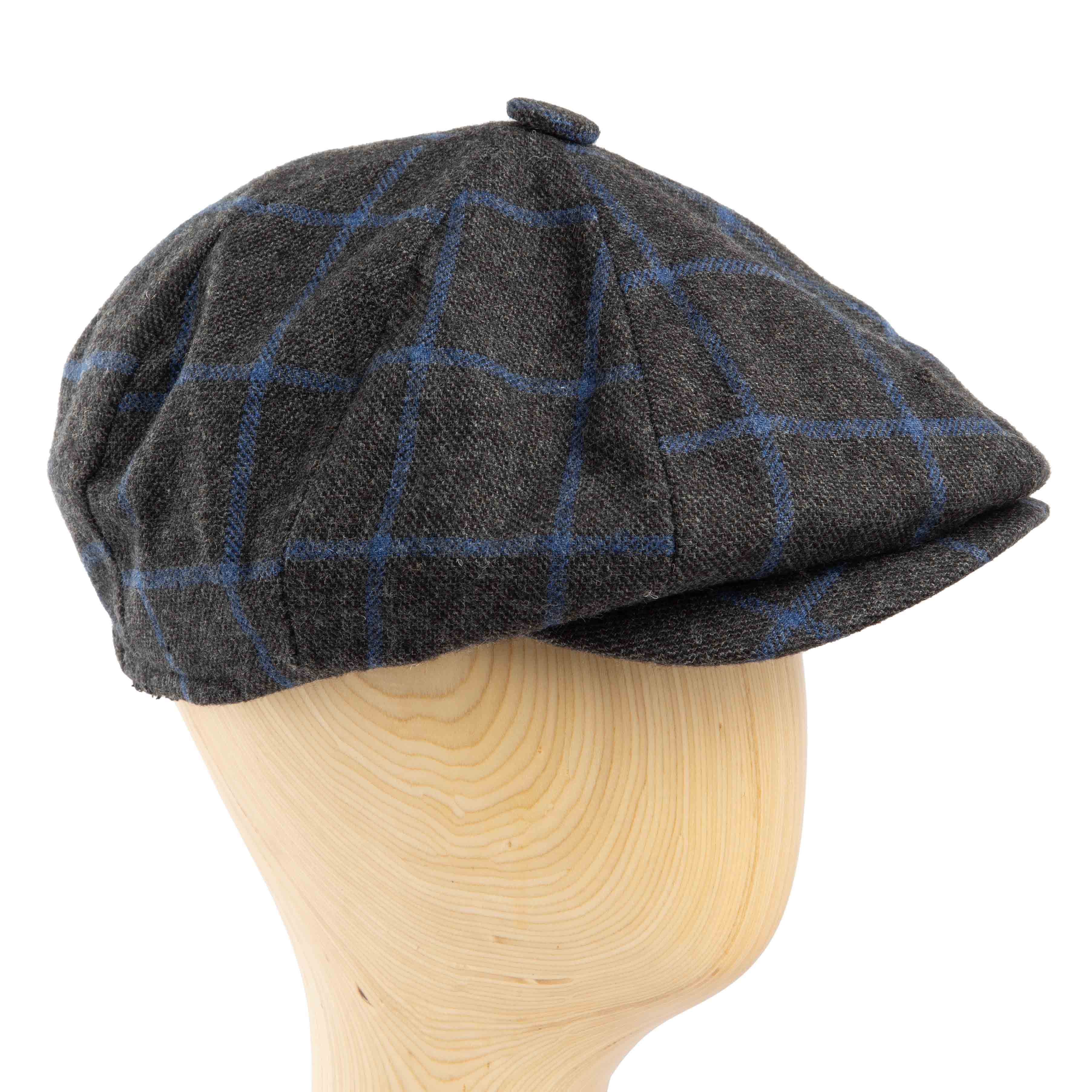 Dark grey newsboy cap with blue windowpane check - classic unisex style.