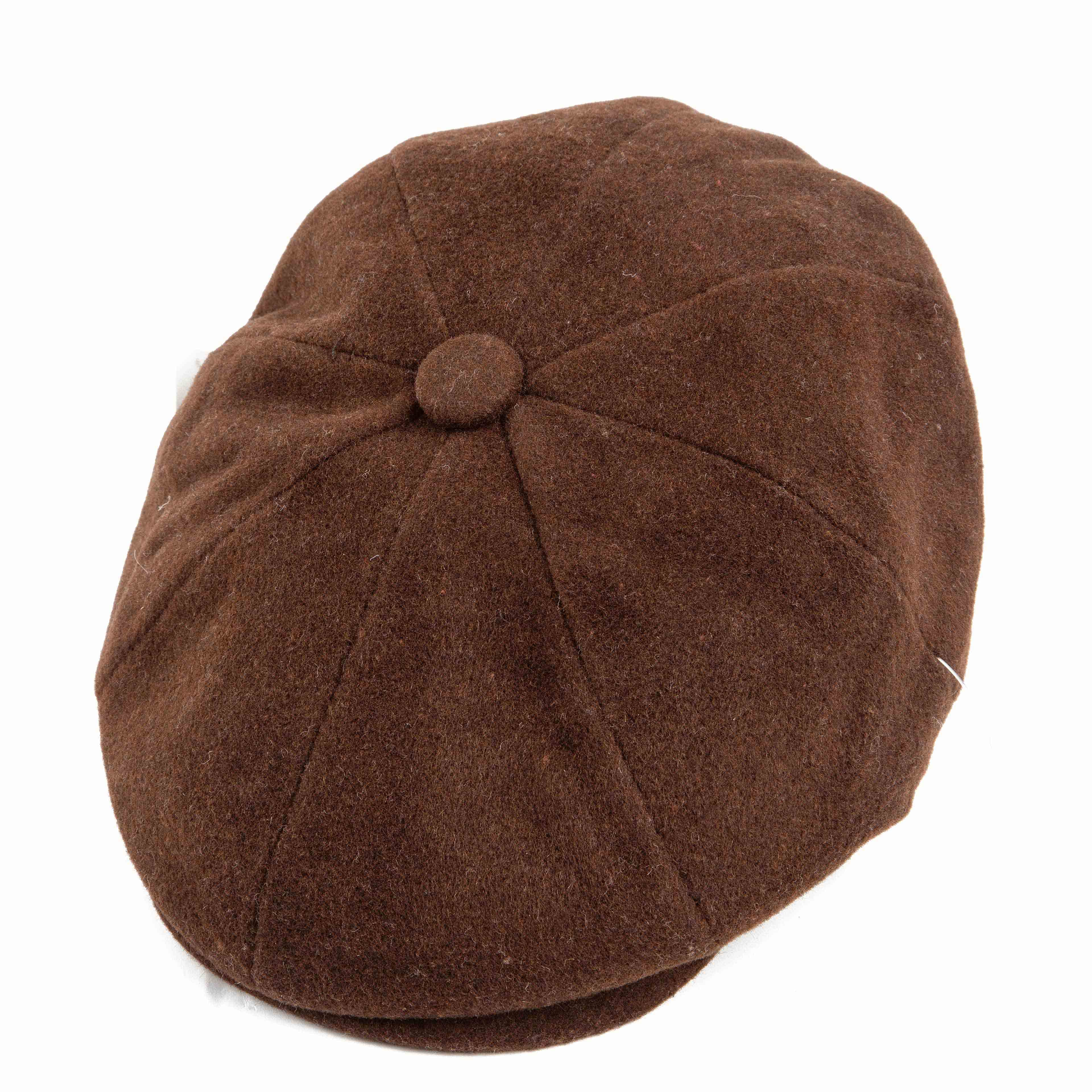 Classic solid brown newsboy cap. This versatile unisex flat cap offers timeless style, comfort, and a rich, warm touch for any outfit.