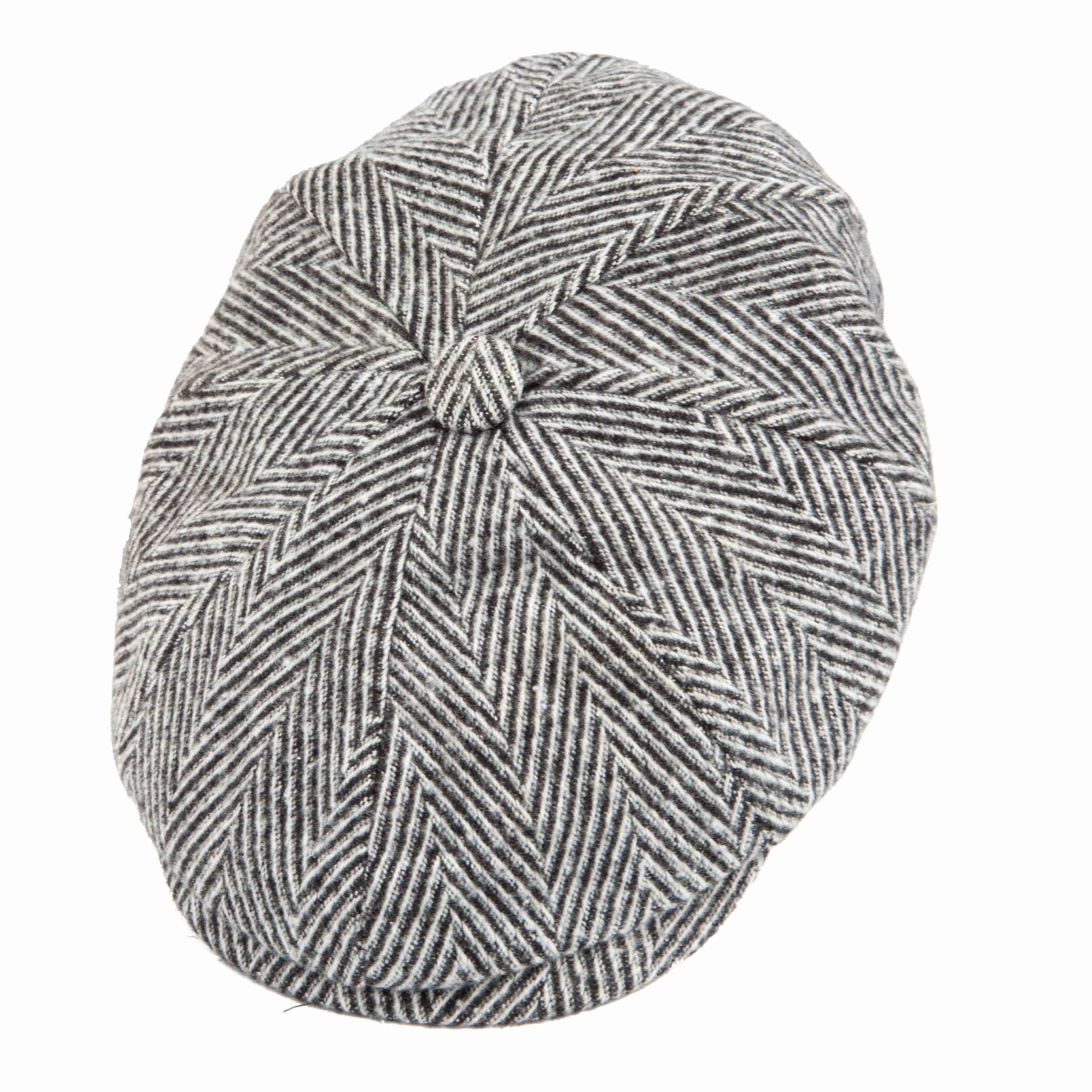 This is a stylish flat cap, also often categorized as a newsboy or ivy cap due to its multi-paneled crown and slightly rounded shape. 