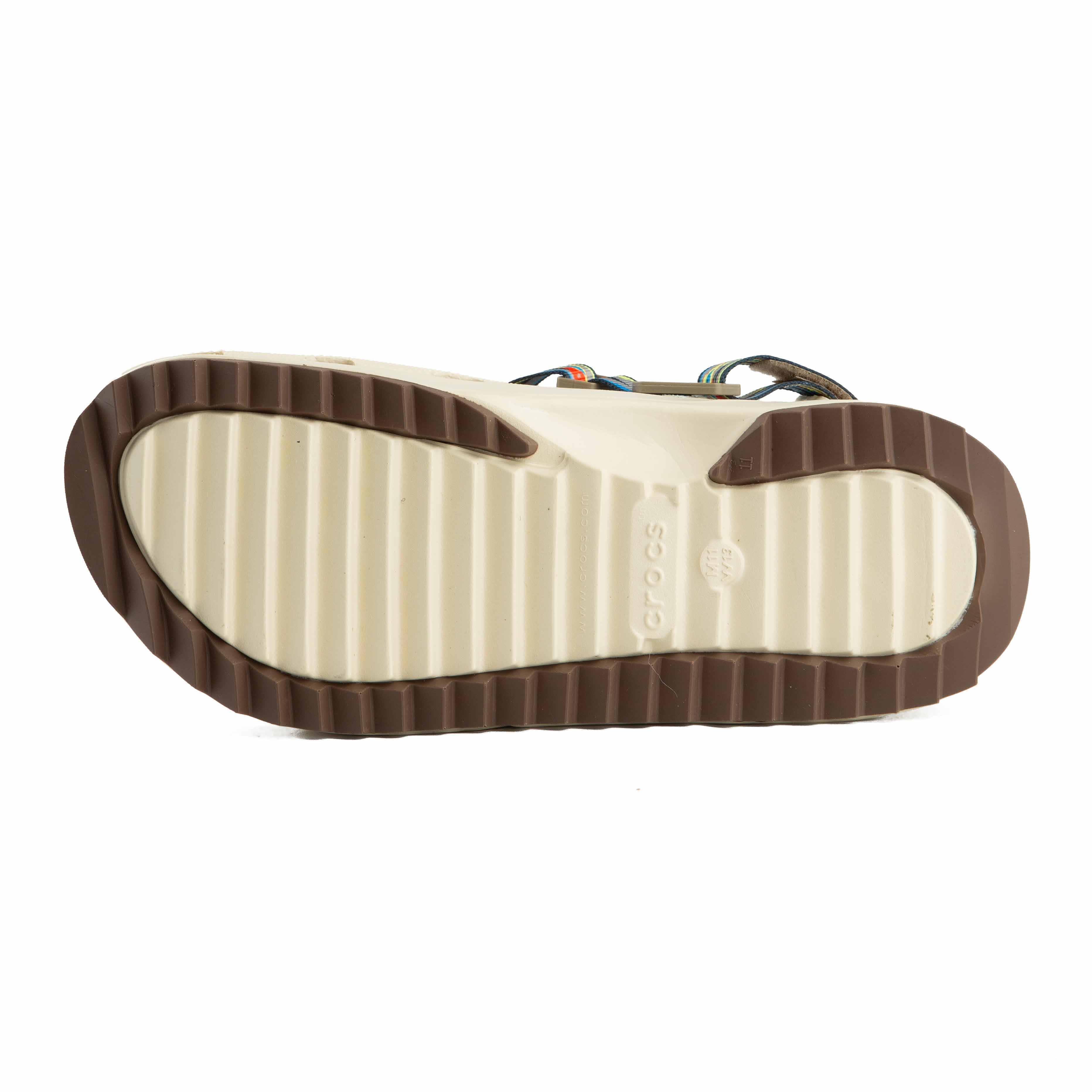 Features a unique patterned strap, chunky sole, and custom Jibbitz for ultimate style and comfort.