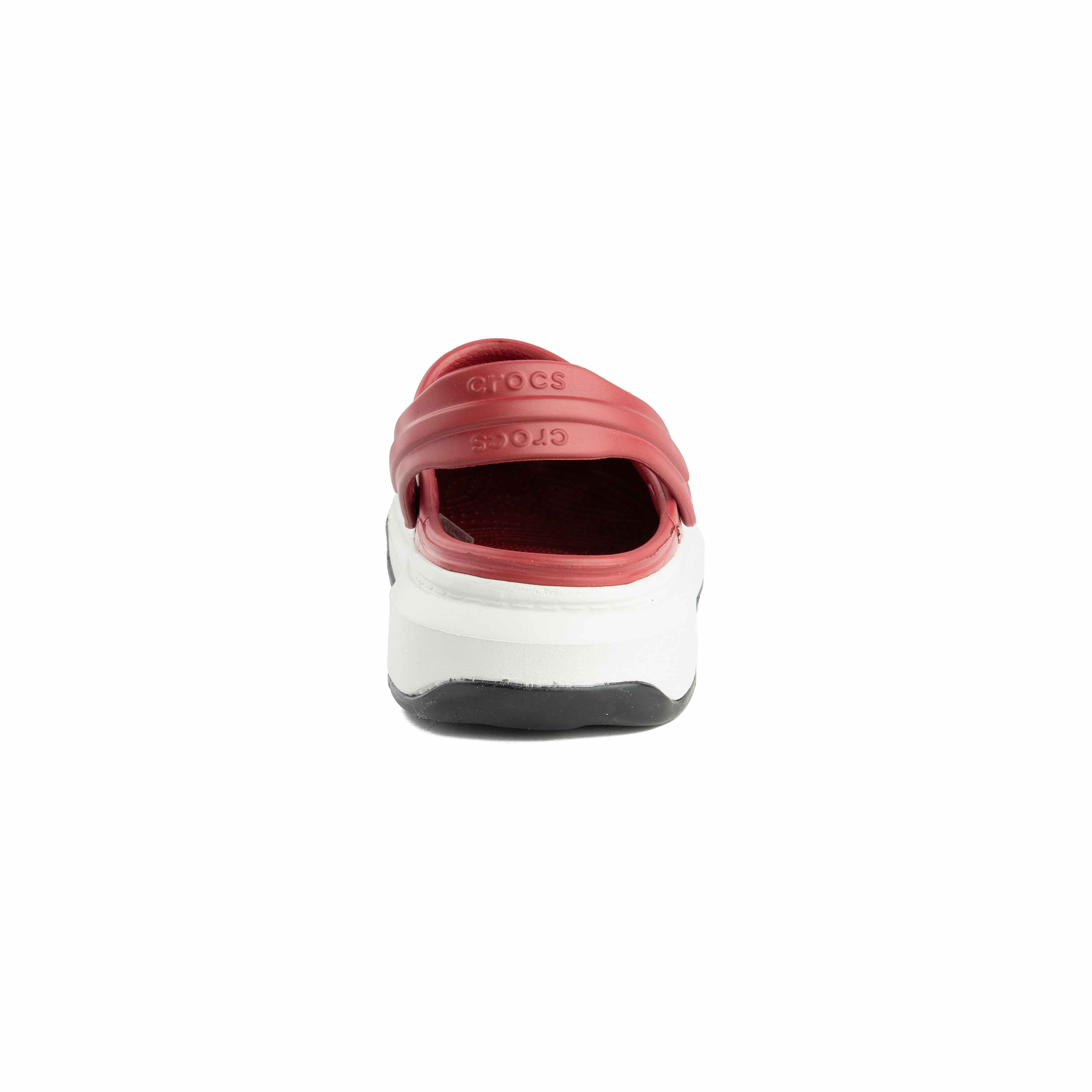 Maroon platform clogs with assorted colorful summer-themed decorative charms, side view.