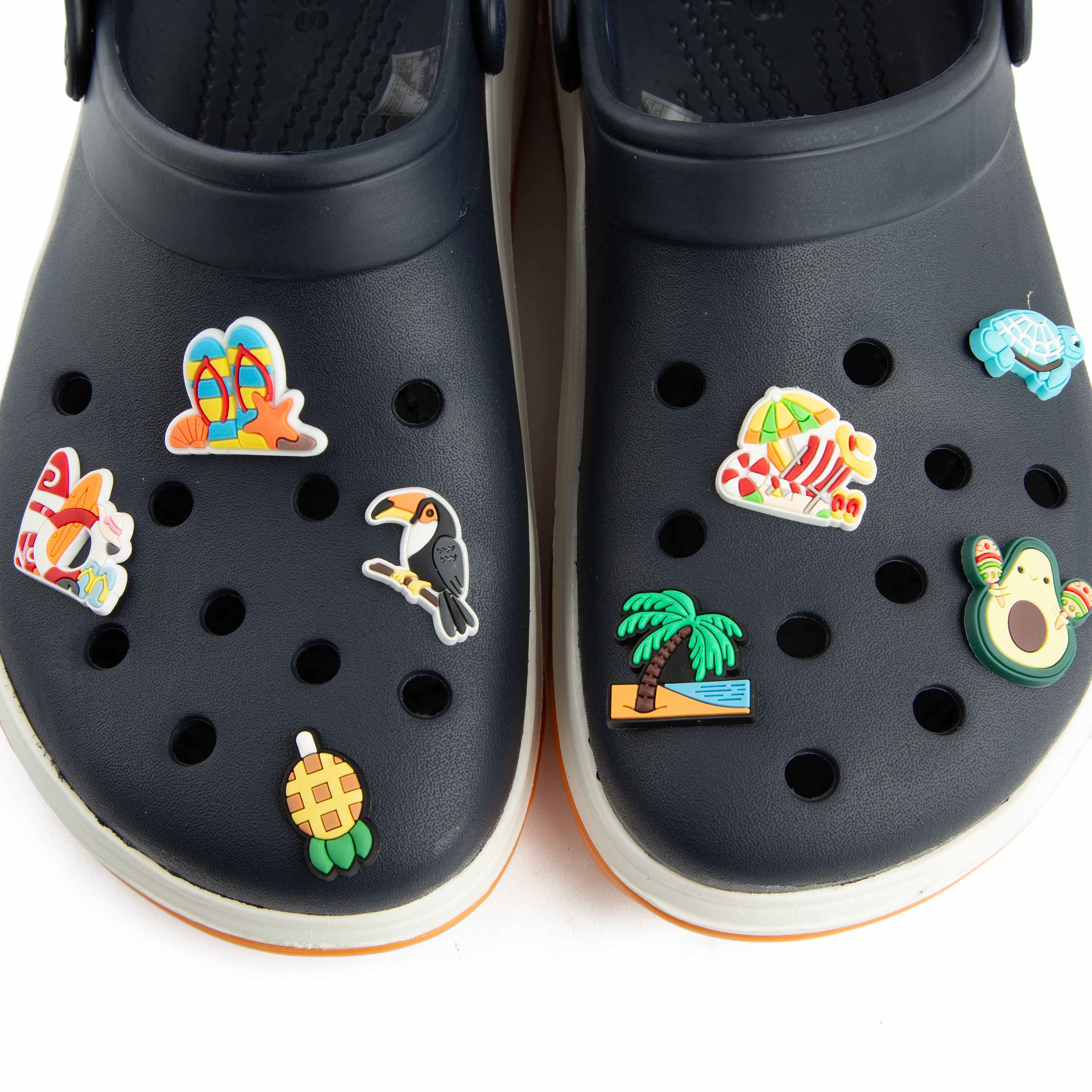 These are classic, comfortable clogs in a versatile navy blue, enhanced with a playful summer vibe