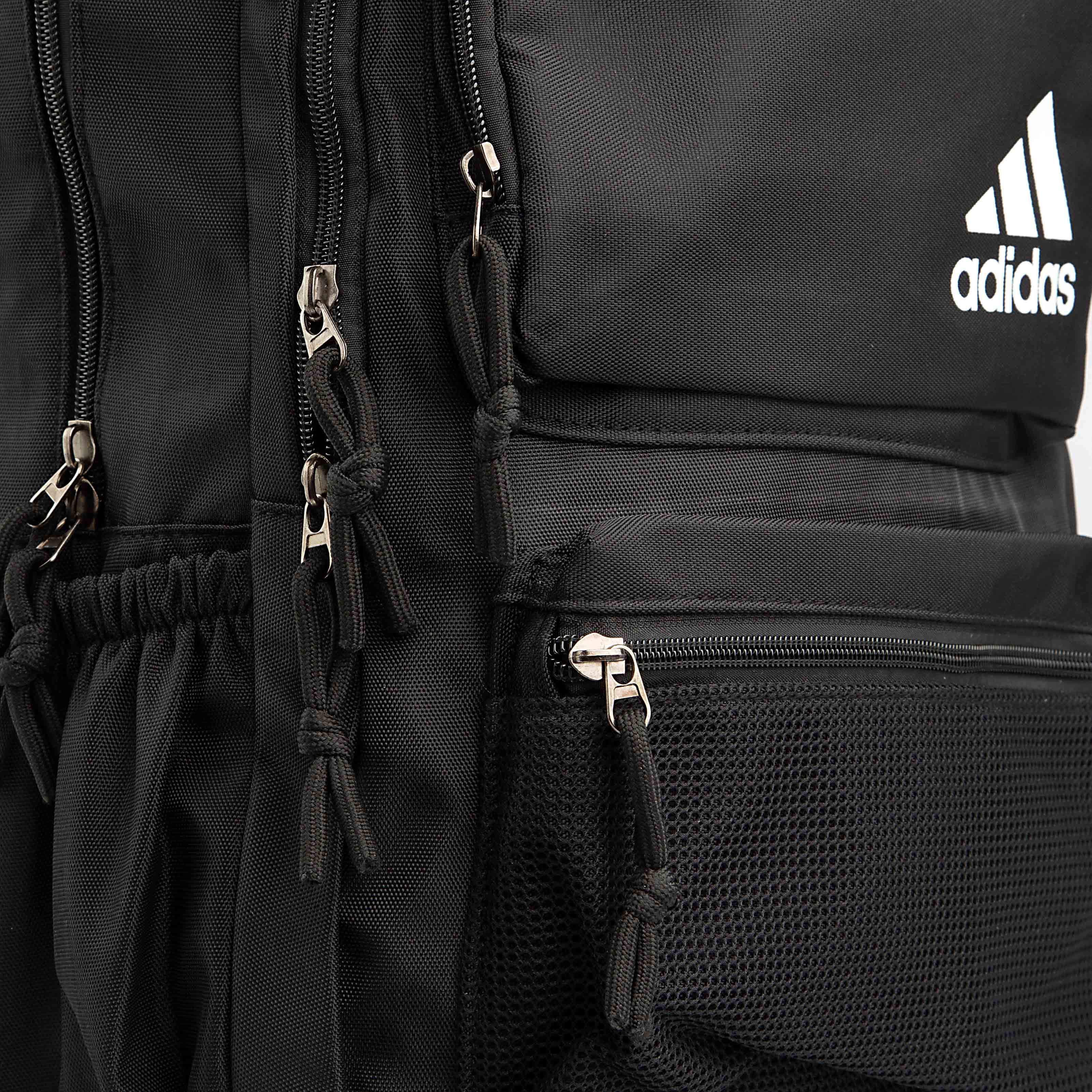 This is a classic black backpack from adidas, featuring the iconic white "adidas" logo and the three stripes on the front.