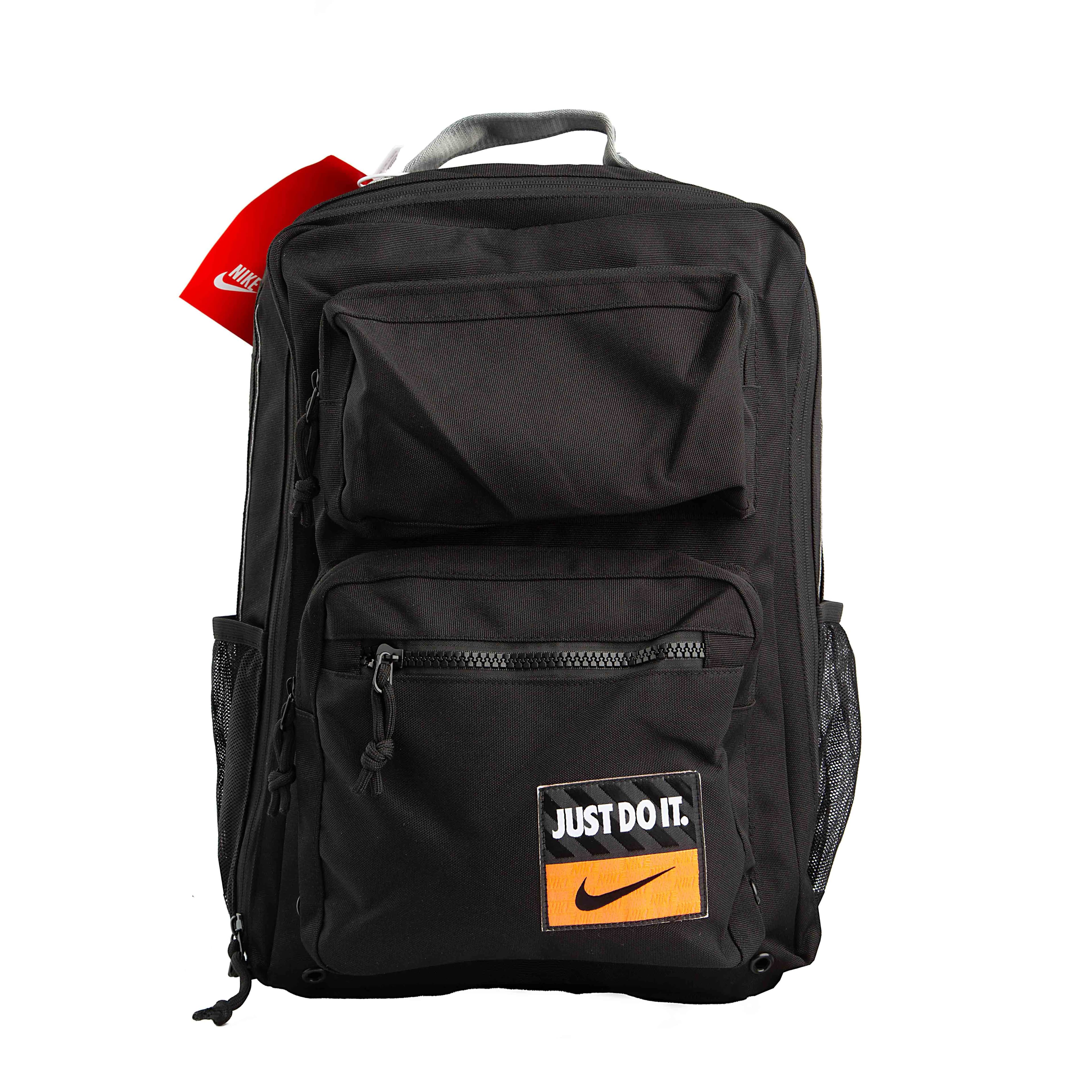 This is a durable, multi-pocket backpack from Nike, designed for practicality and organization. 