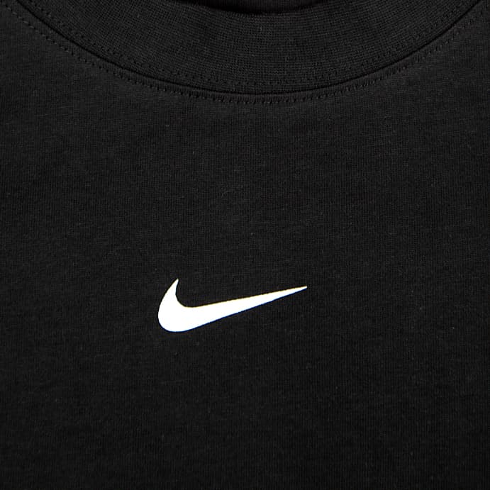 Back of a black Nike x NOCTA t-shirt with a large white "NOCTA" logo printed on it.