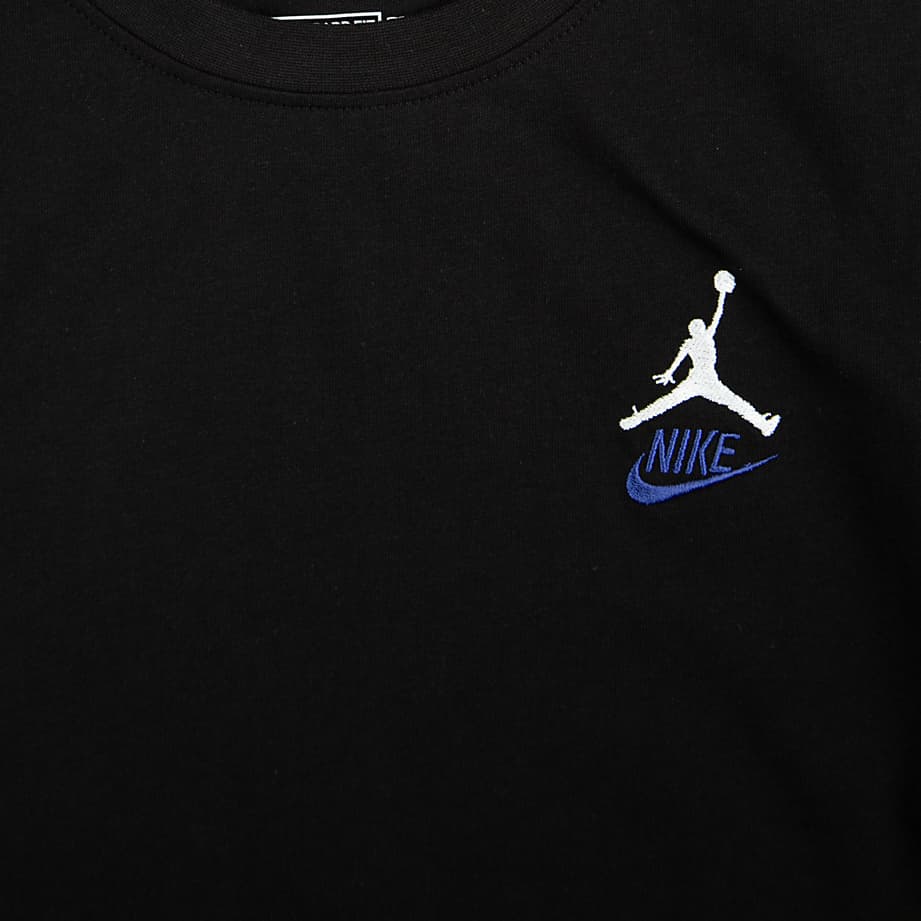 Celebrate individuality with the Air Jordan Rare Air AJ3 T-Shirt. This black, midweight cotton tee features iconic Jumpman branding, honoring the spirit of self-expression. Perfect for sneakerheads and style enthusiasts."