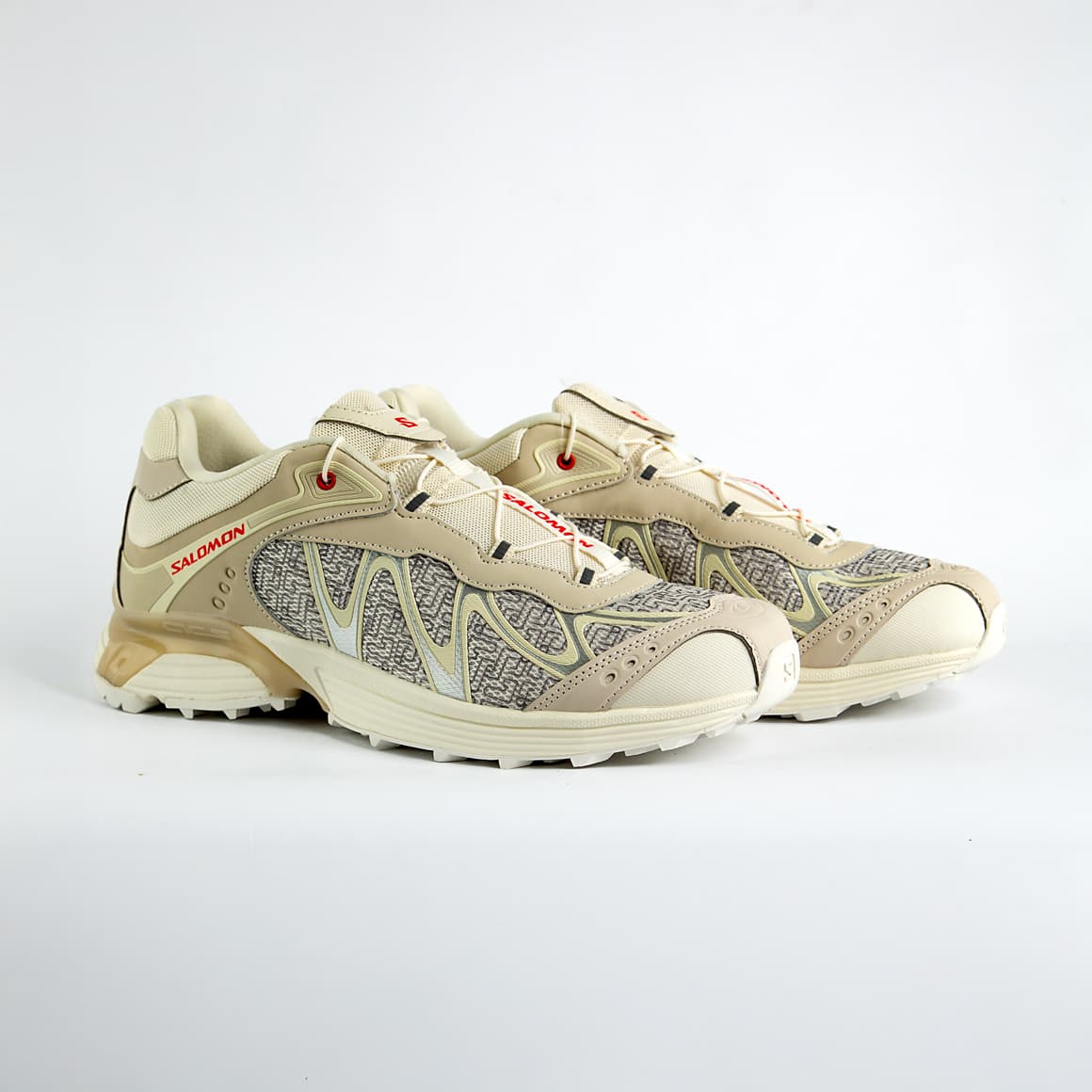 style with the Salomon XT-Whisper Panhui. These unisex sneakers blend trail-ready tech with modern aesthetics for unmatched comfort and versatility. Perfect for urban adventures and celebrating heritage