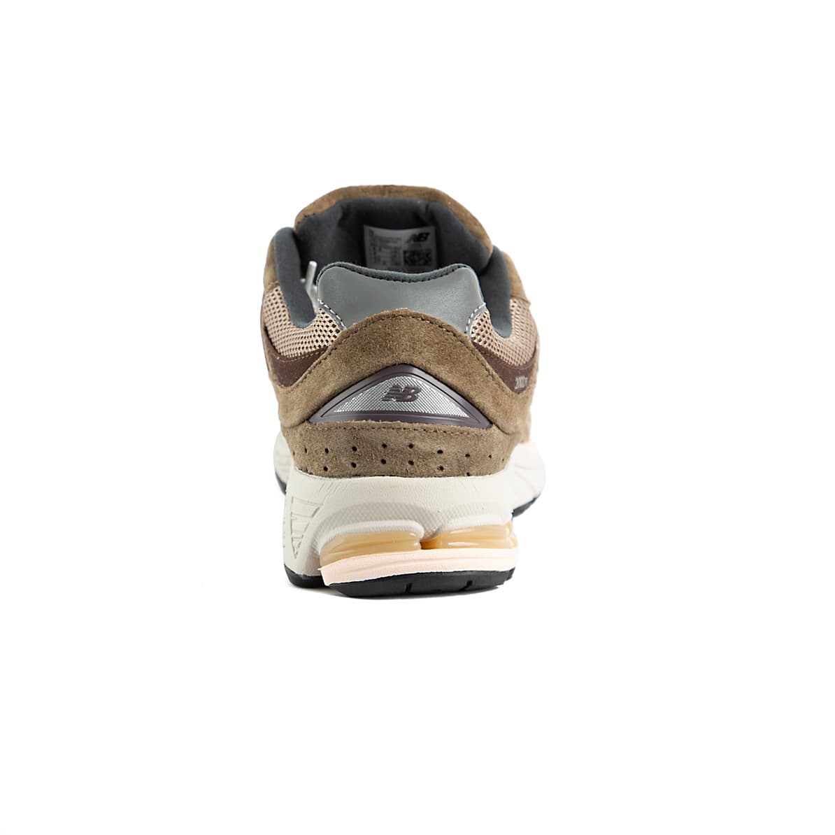 Pair of New Balance 2002R brown and beige sneakers on a white background