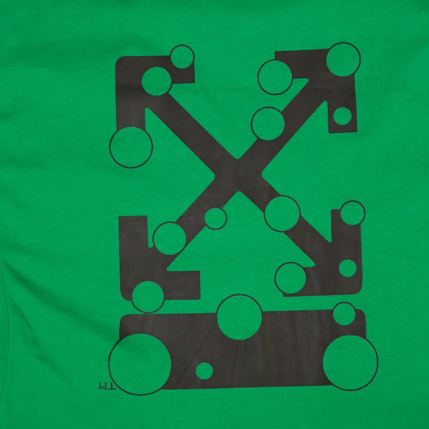 This is a vibrant green, short-sleeved, crew-neck t-shirt from the high-end streetwear brand Off-White. 