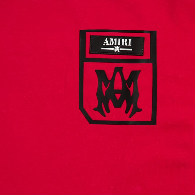 Make a bold statement with the Amiri Red Pocket Logo T-shirt. Featuring the iconic M monogram, this premium cotton tee is the definition of luxury streetwear.