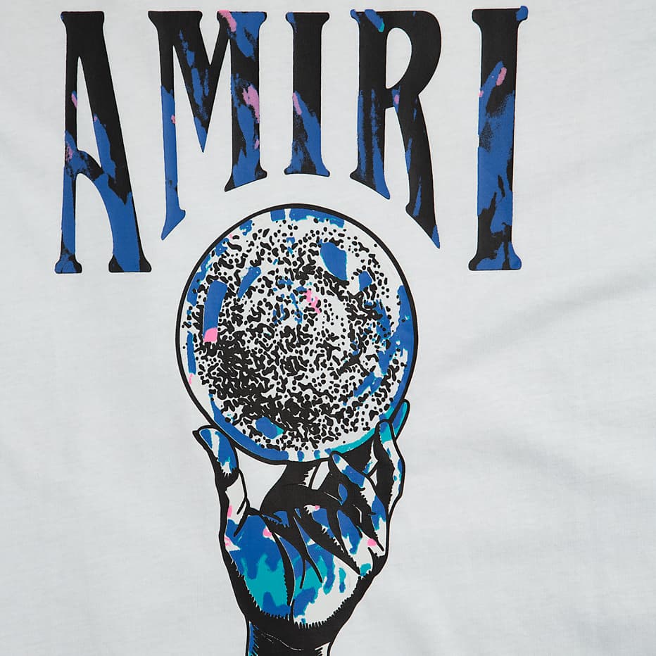 Own the moment with the Amiri White Crystal Ball Graphic T-shirt.