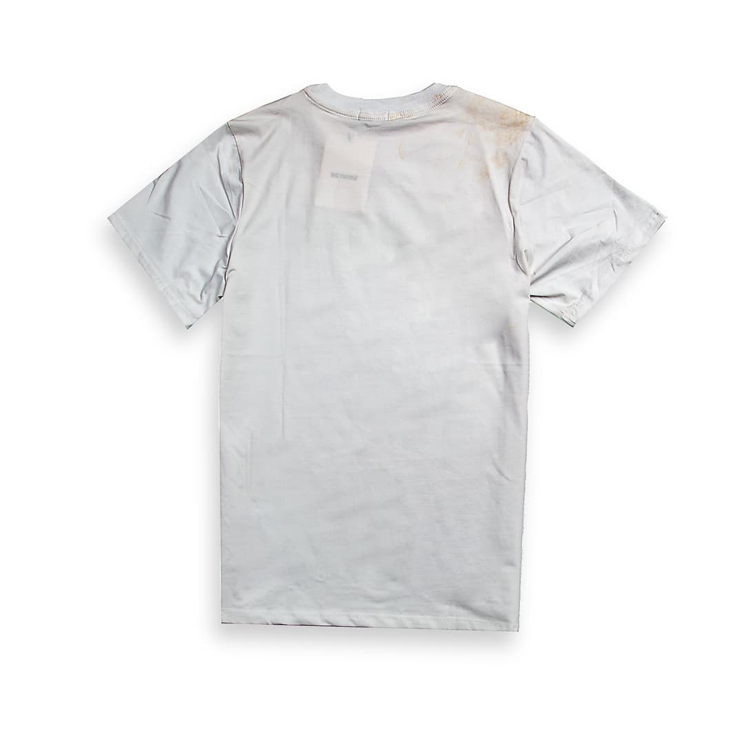White WE11DONE graphic t-shirt with glitch logo, short sleeves, streetwear style, laid flat.